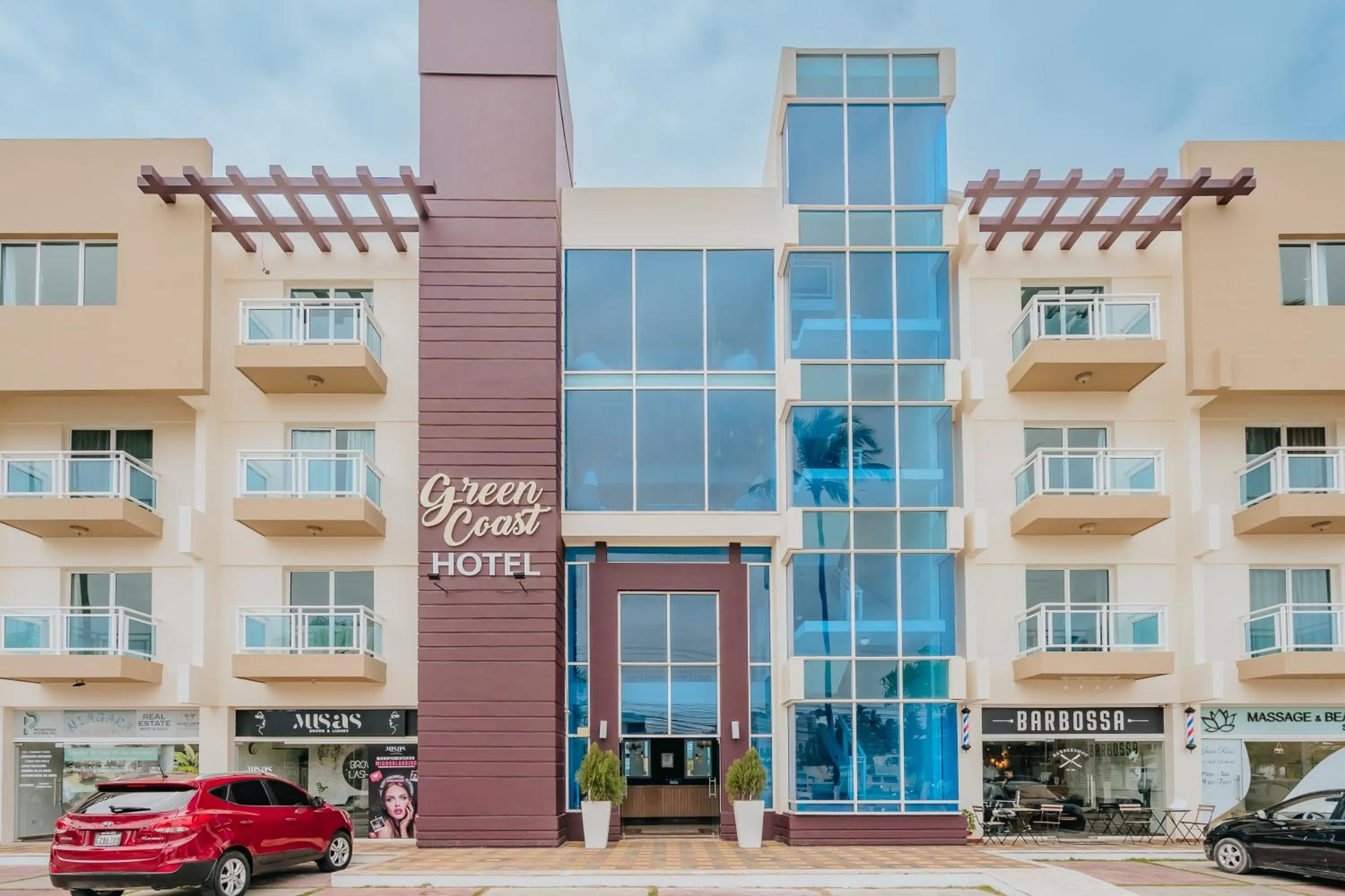 Property building in Hotel Checkin El Cortecito