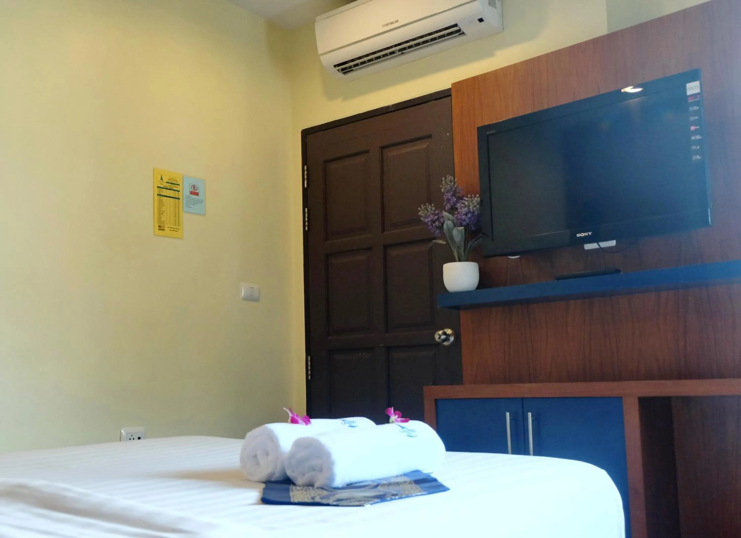 Bed in Calypso Patong Hotel