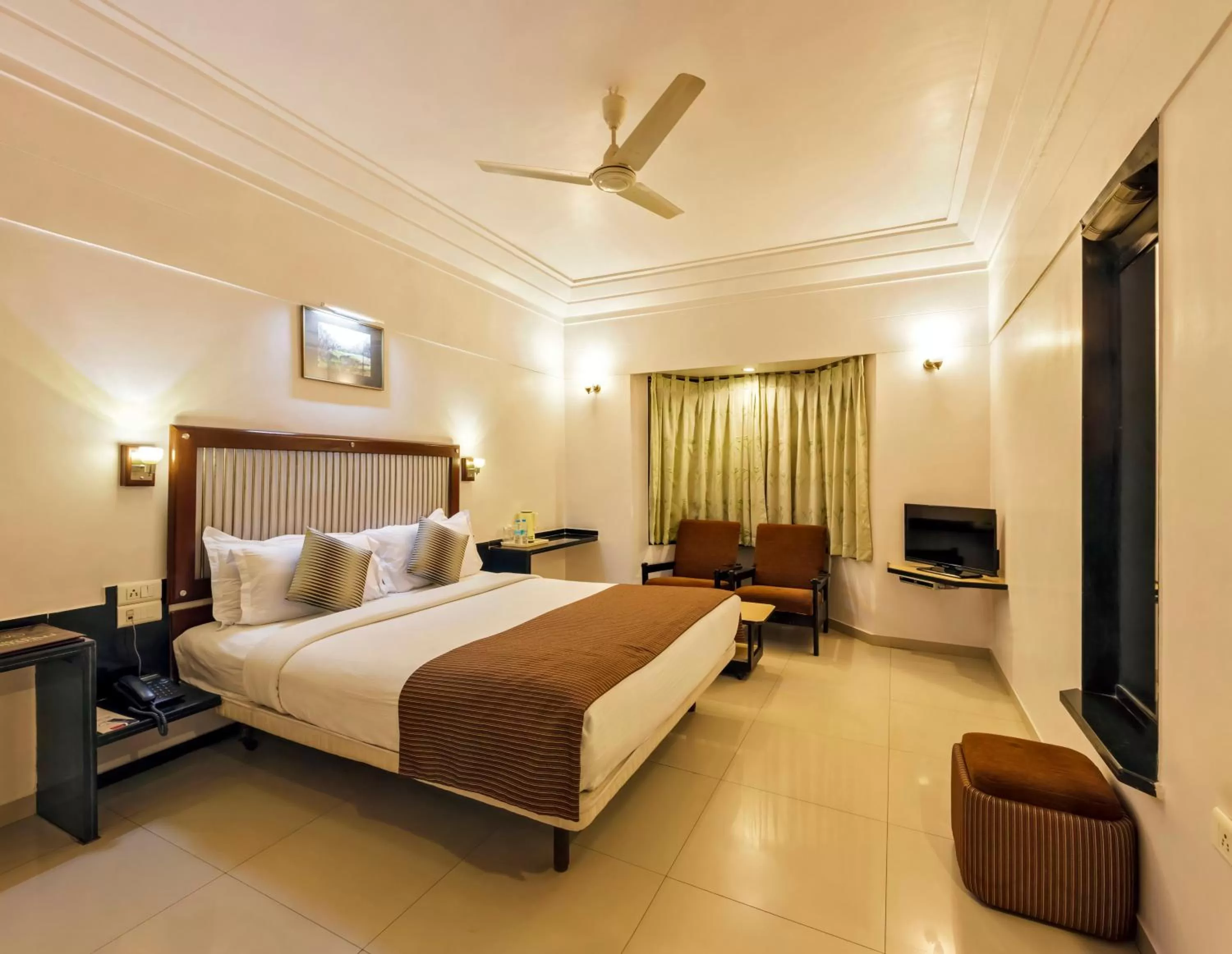 Photo of the whole room, Bed in Hotel Vrishali Executive