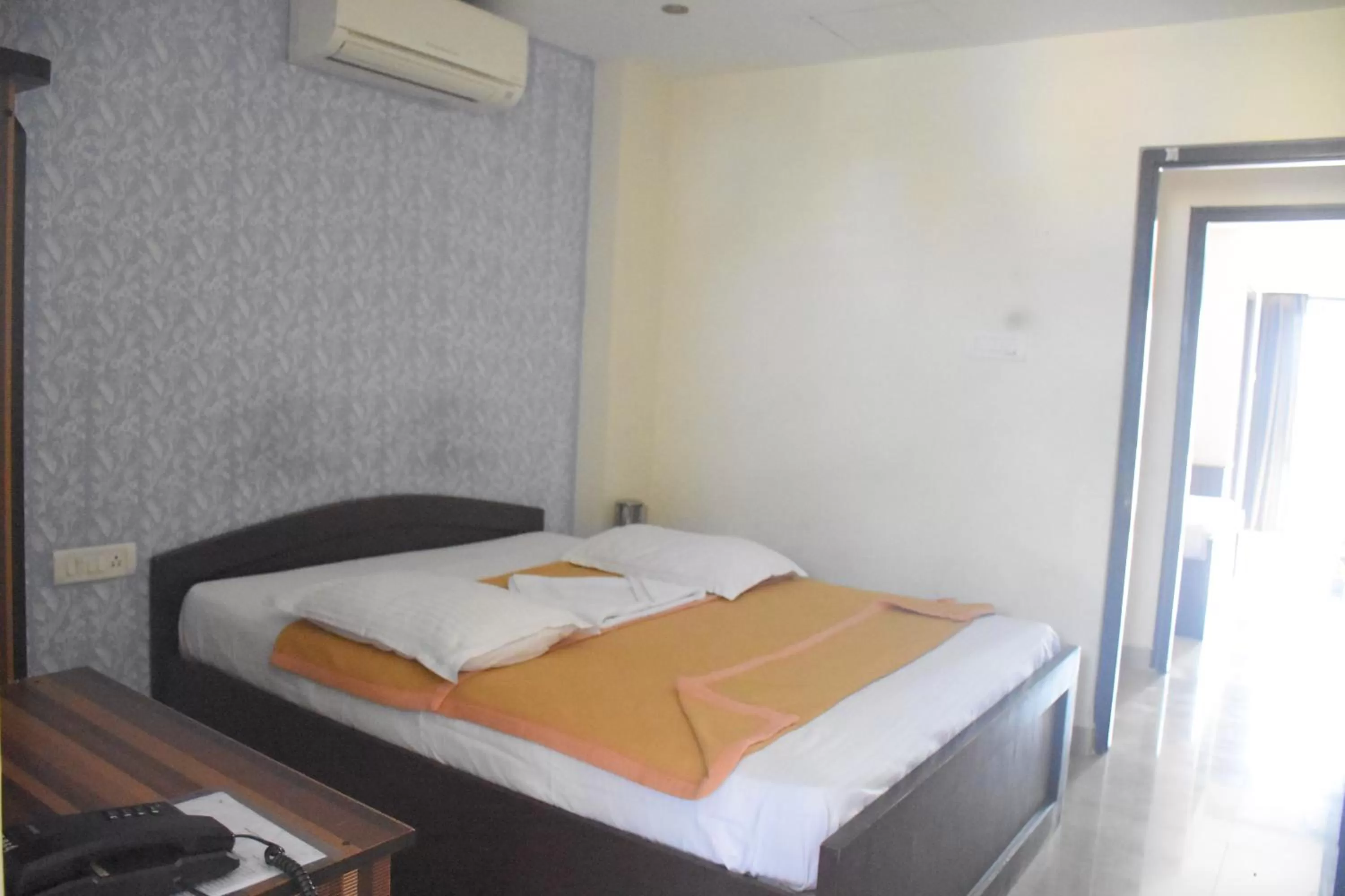 Bed in Star MSR Residency