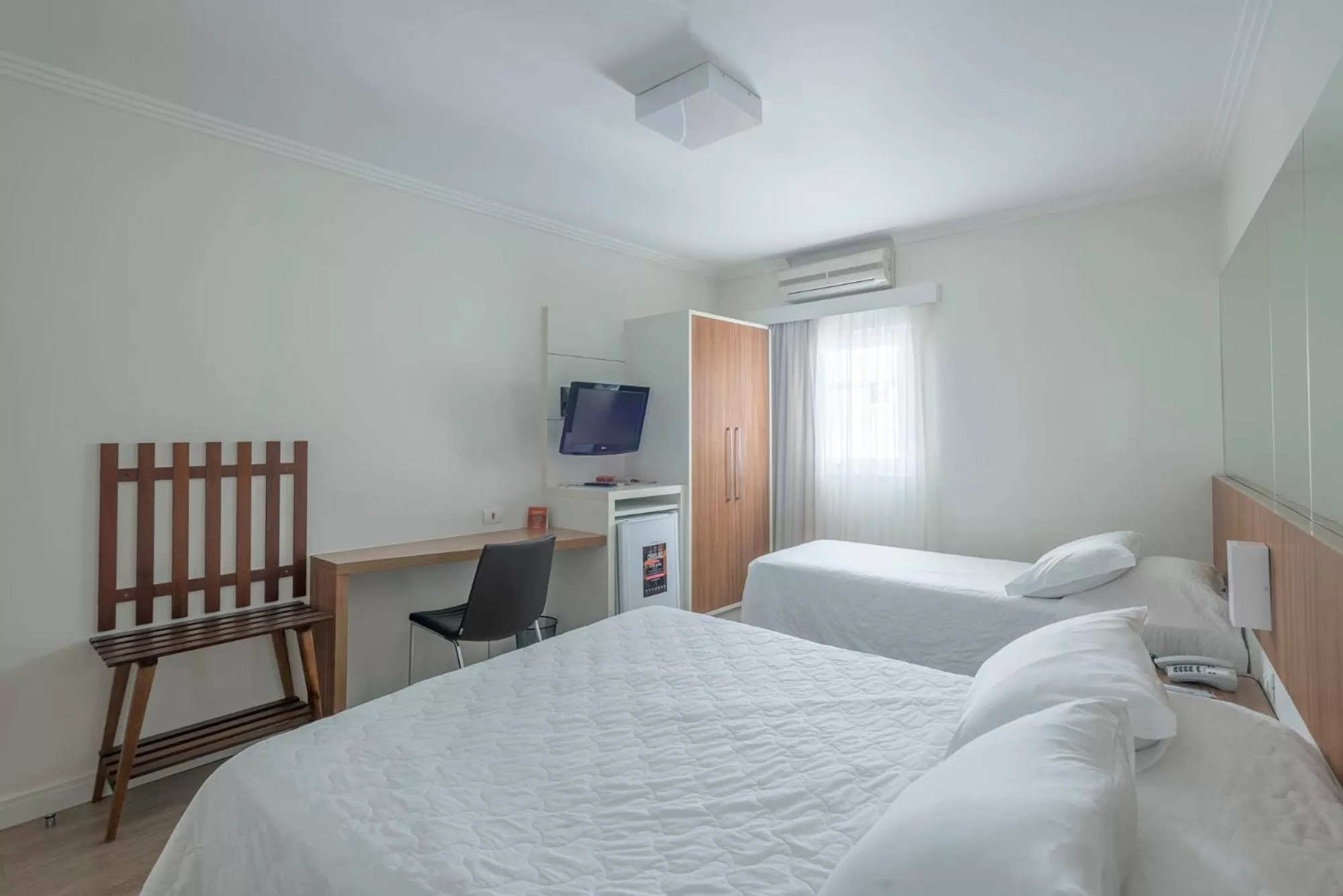 Bed in Hotel Glória