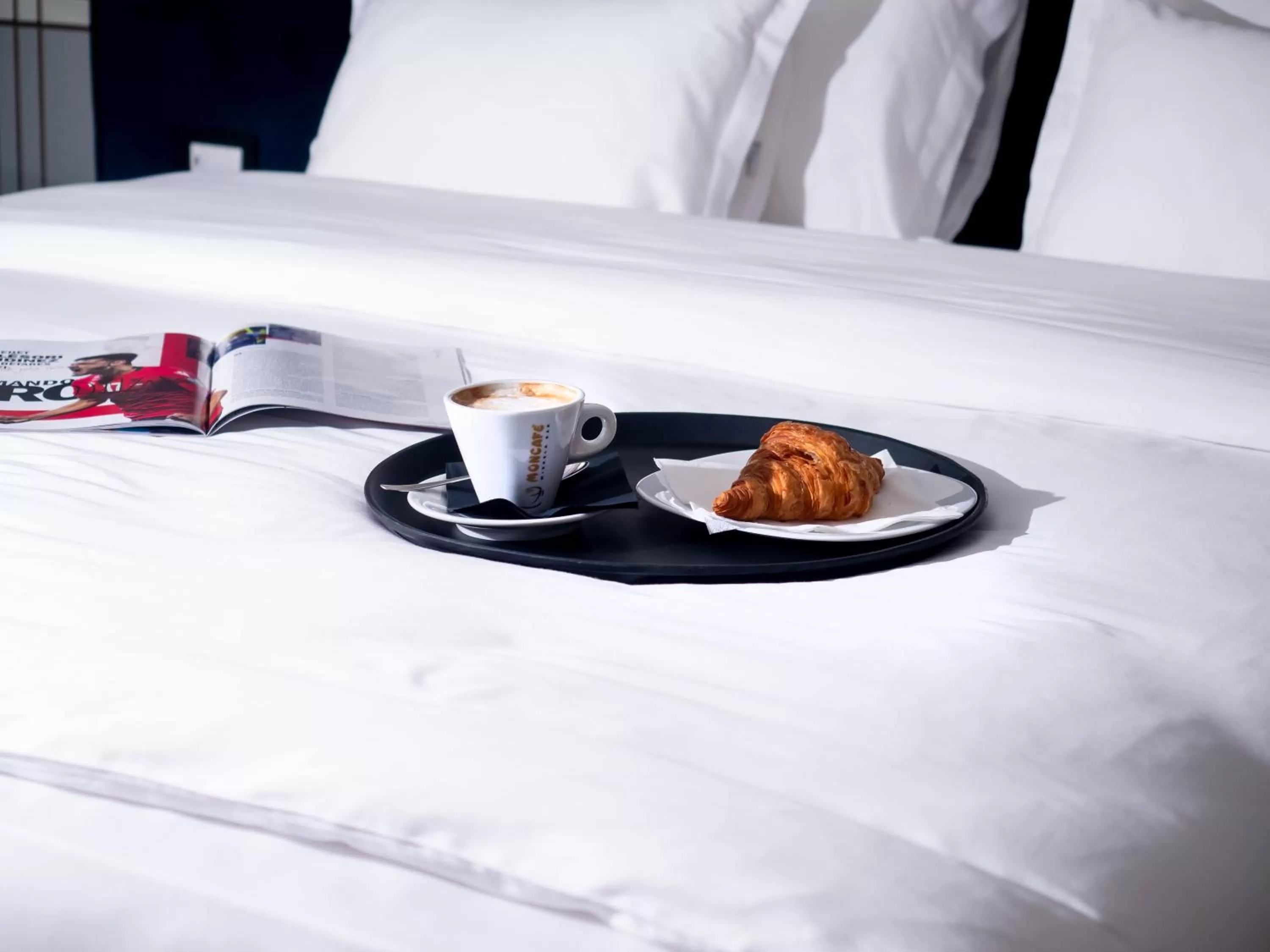 Bed in Moncafe BoutiqueHotel Spa