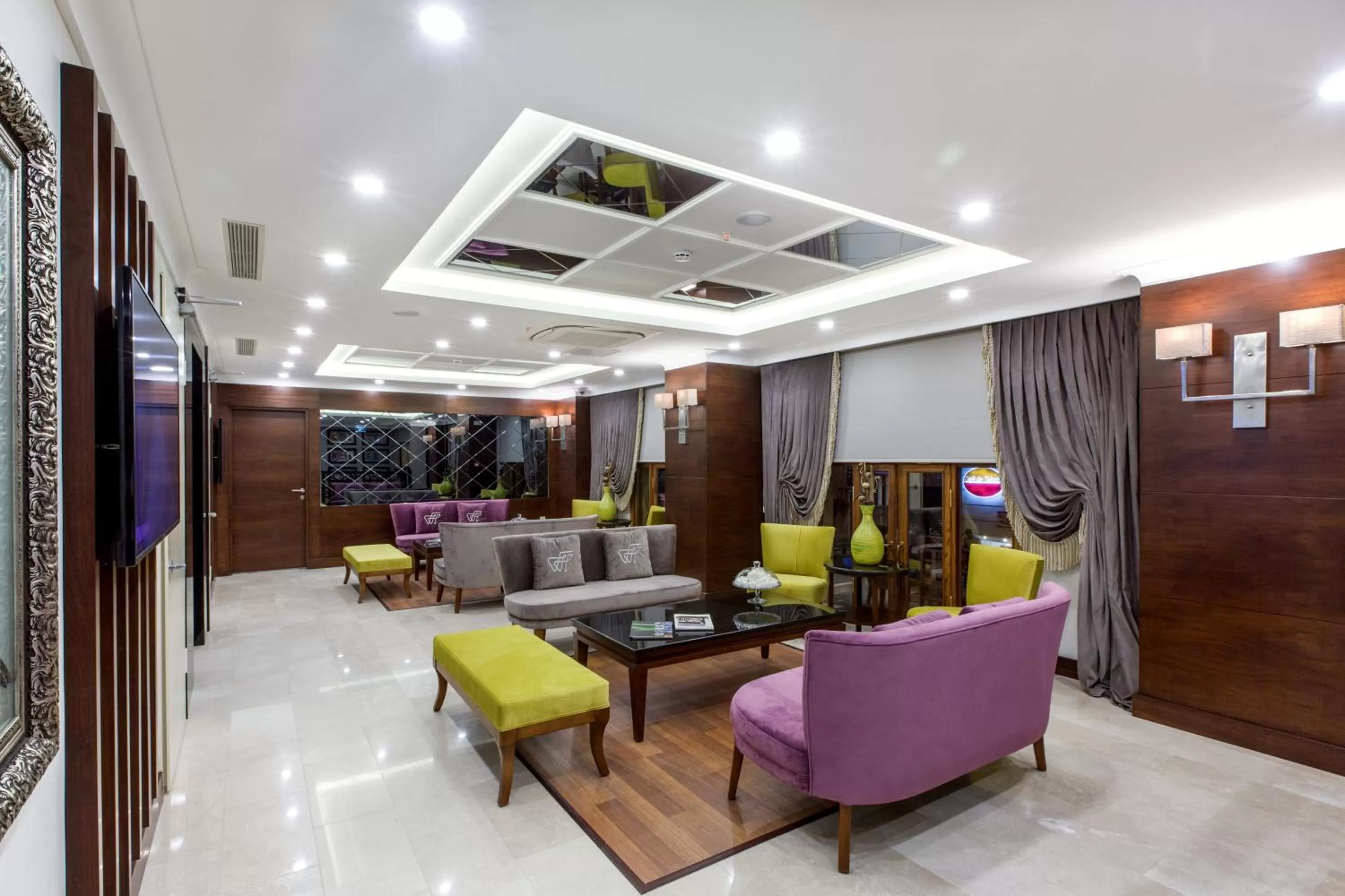 Communal lounge/ TV room in Ferman Hilal Hotel-Special Category