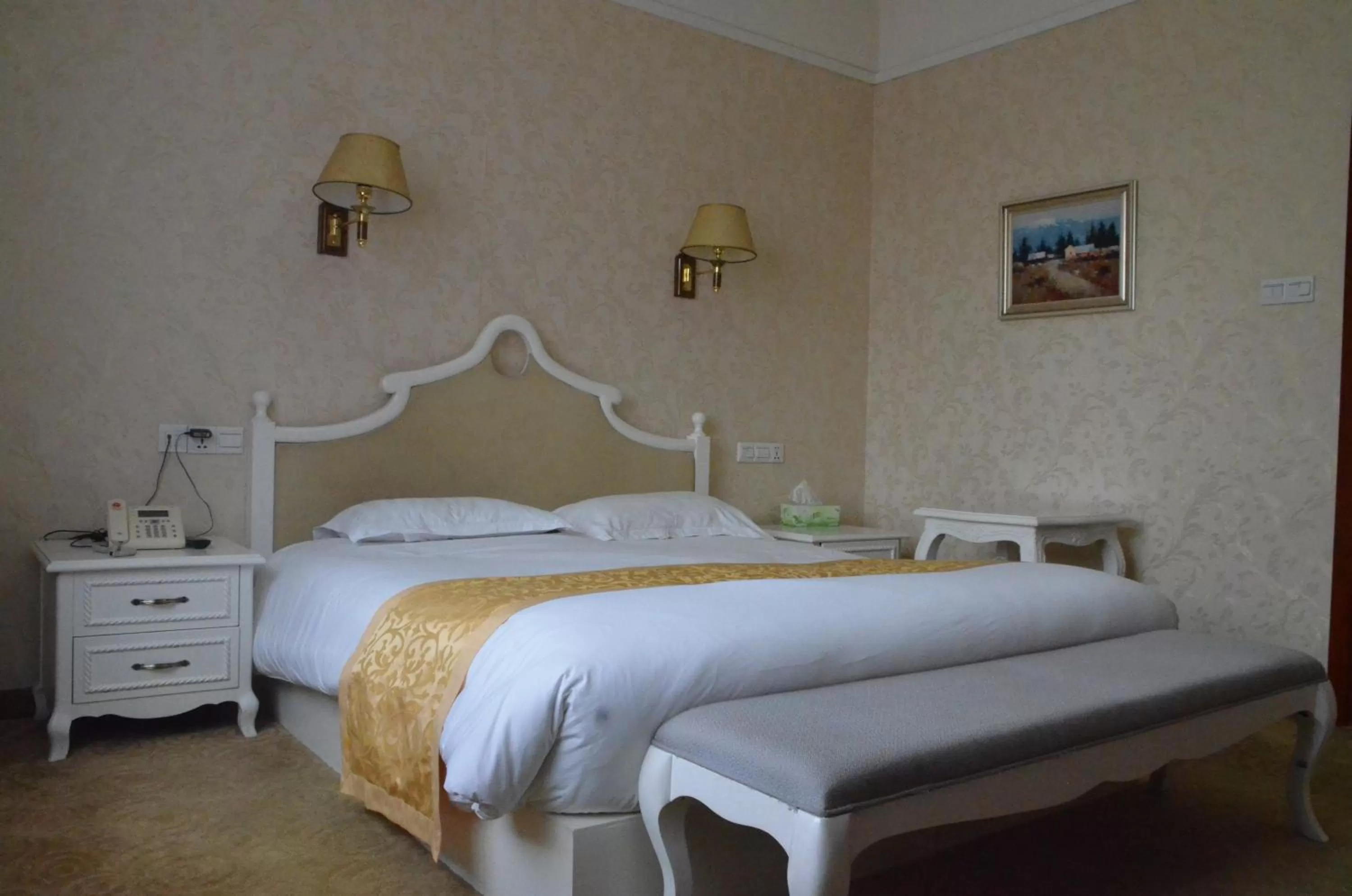 Bed in Soluxe Club International Hotel