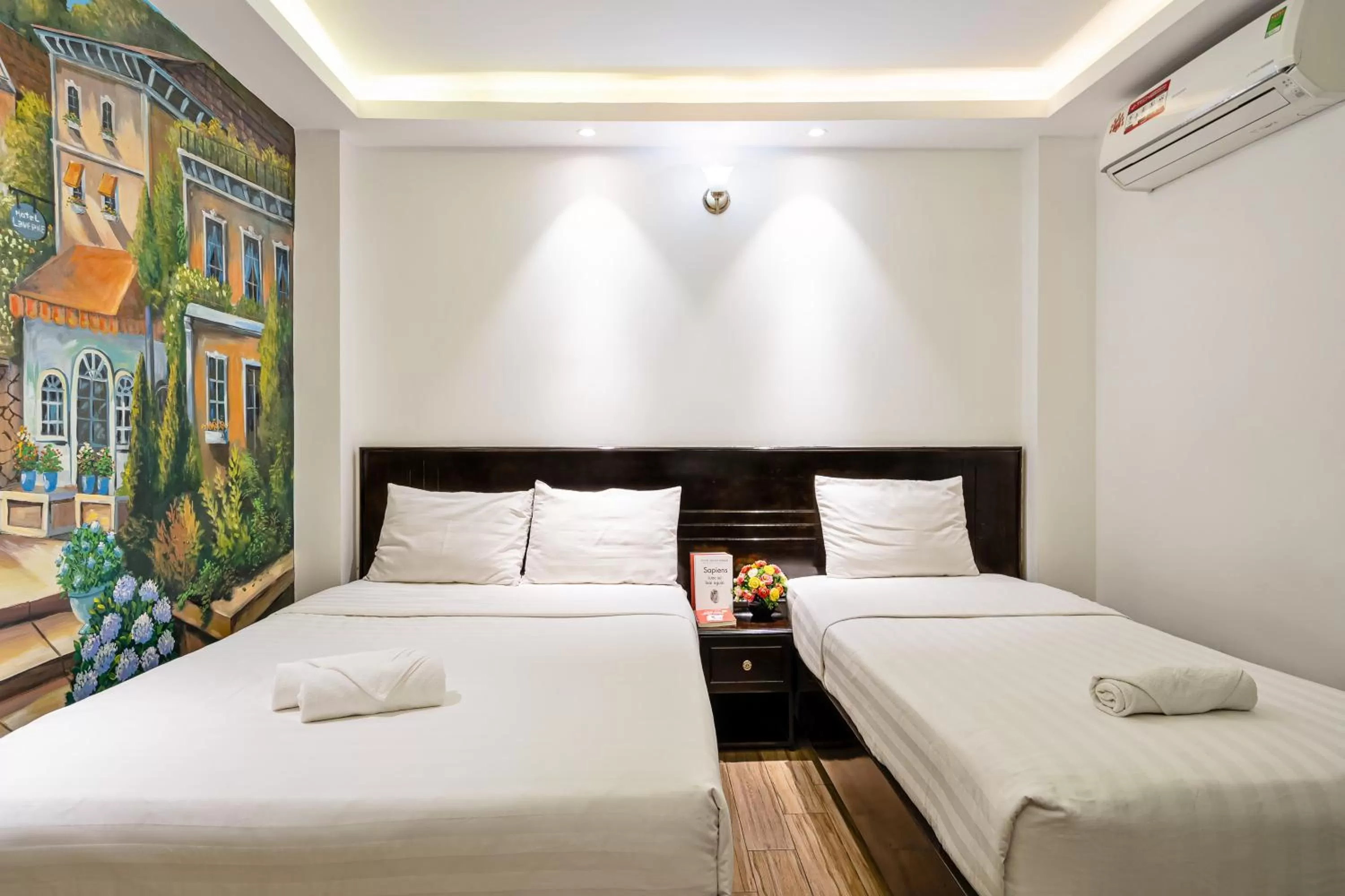 Bed in Lotus Laverne Hotel