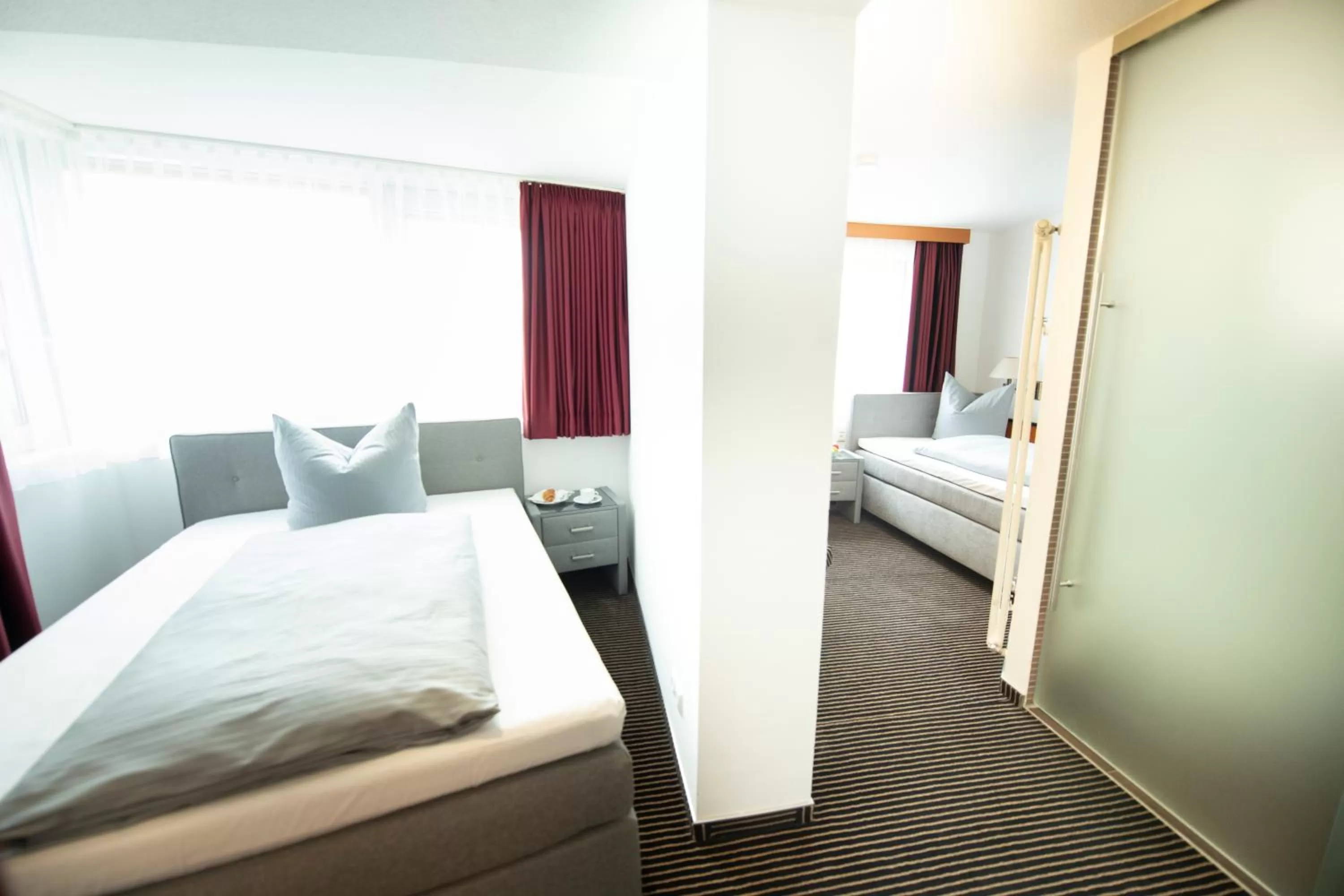 Photo of the whole room, Bed in Stadthotel Giengen