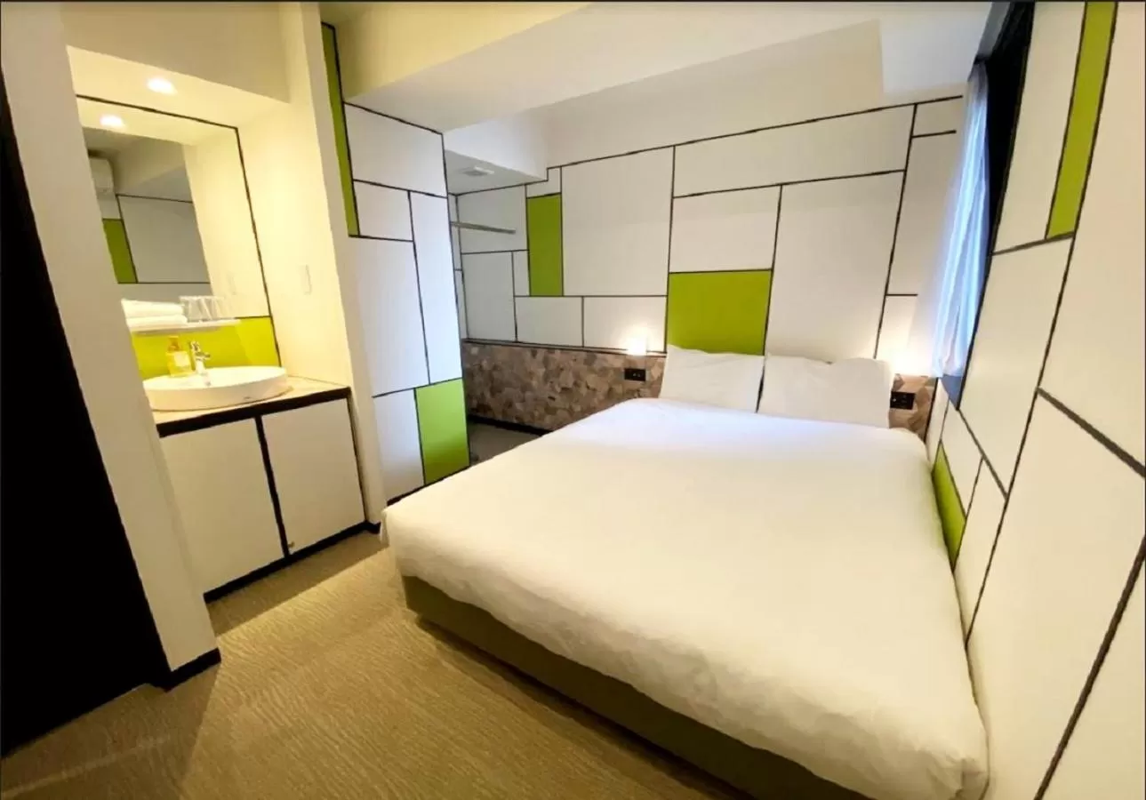 Bed in Henn na Hotel Osaka Shinsaibashi