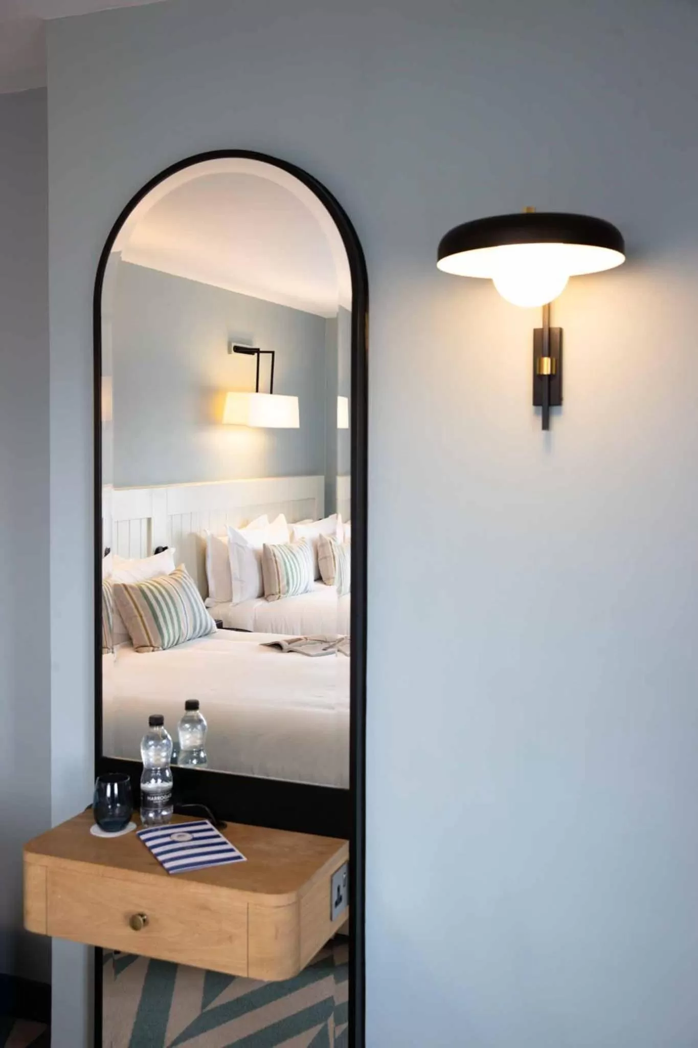 Bed in The Relais Cooden Beach and Spa