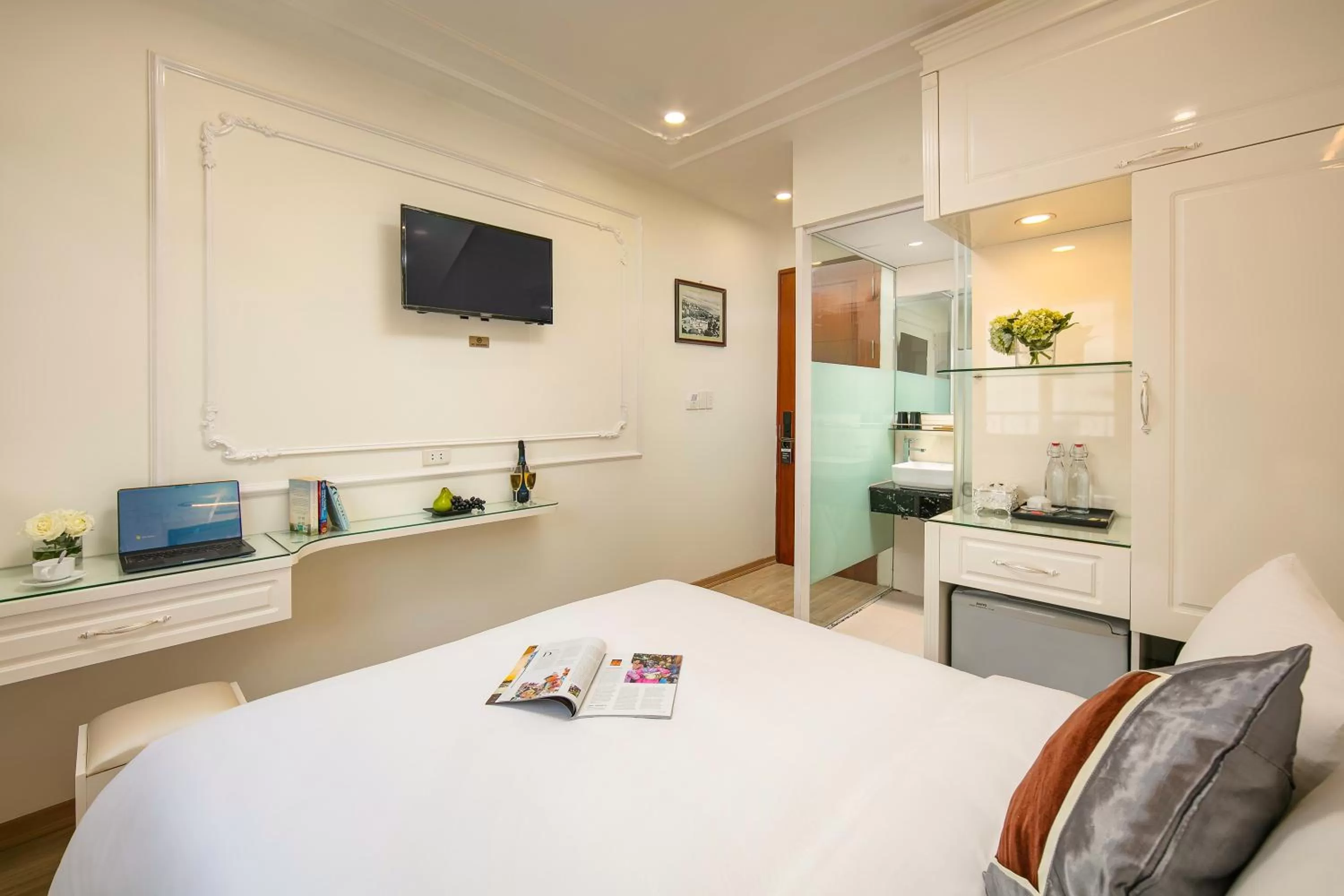 Bed in Tunger Grand Hotel