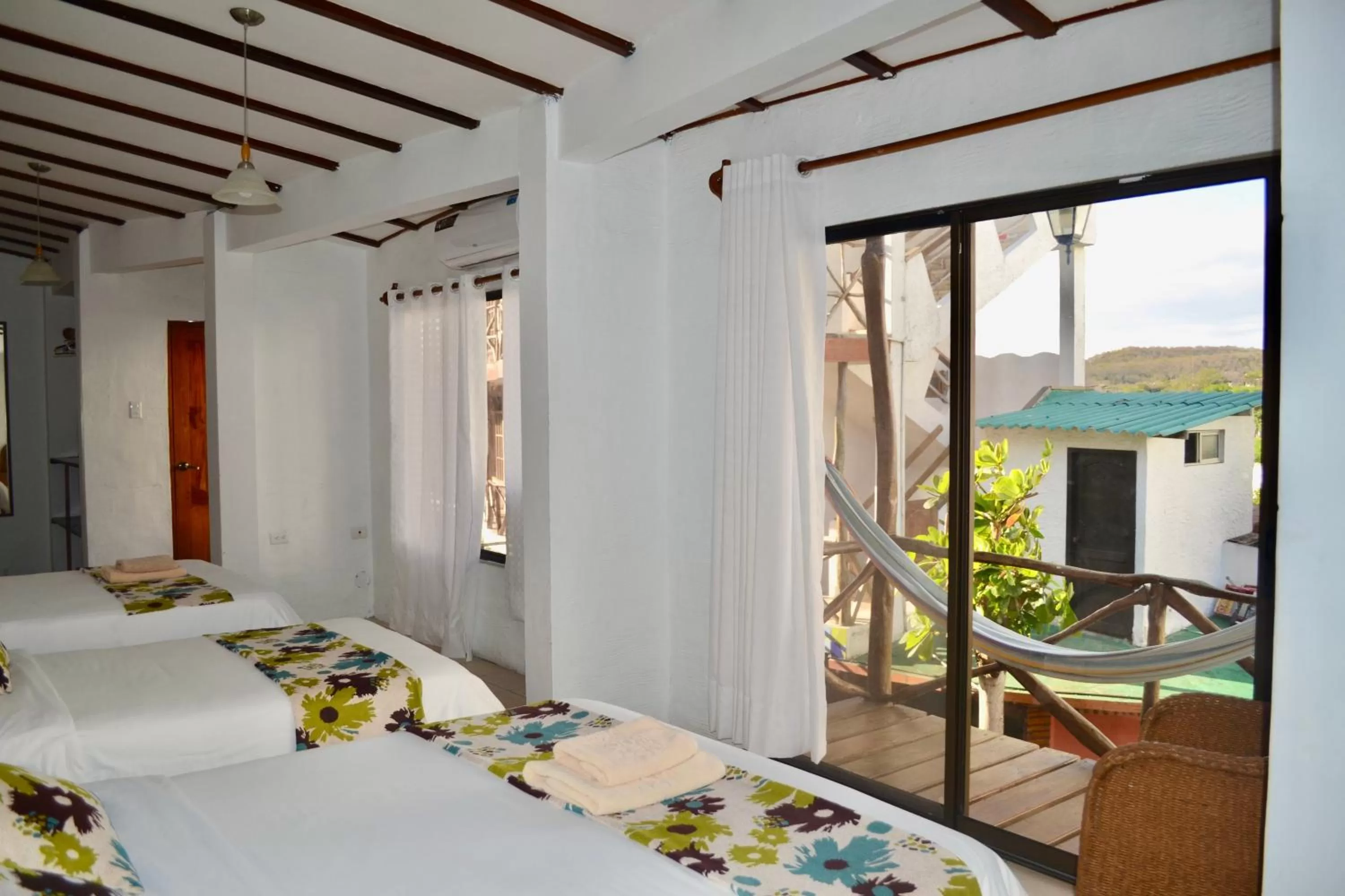 Bed in Hotel Miconia