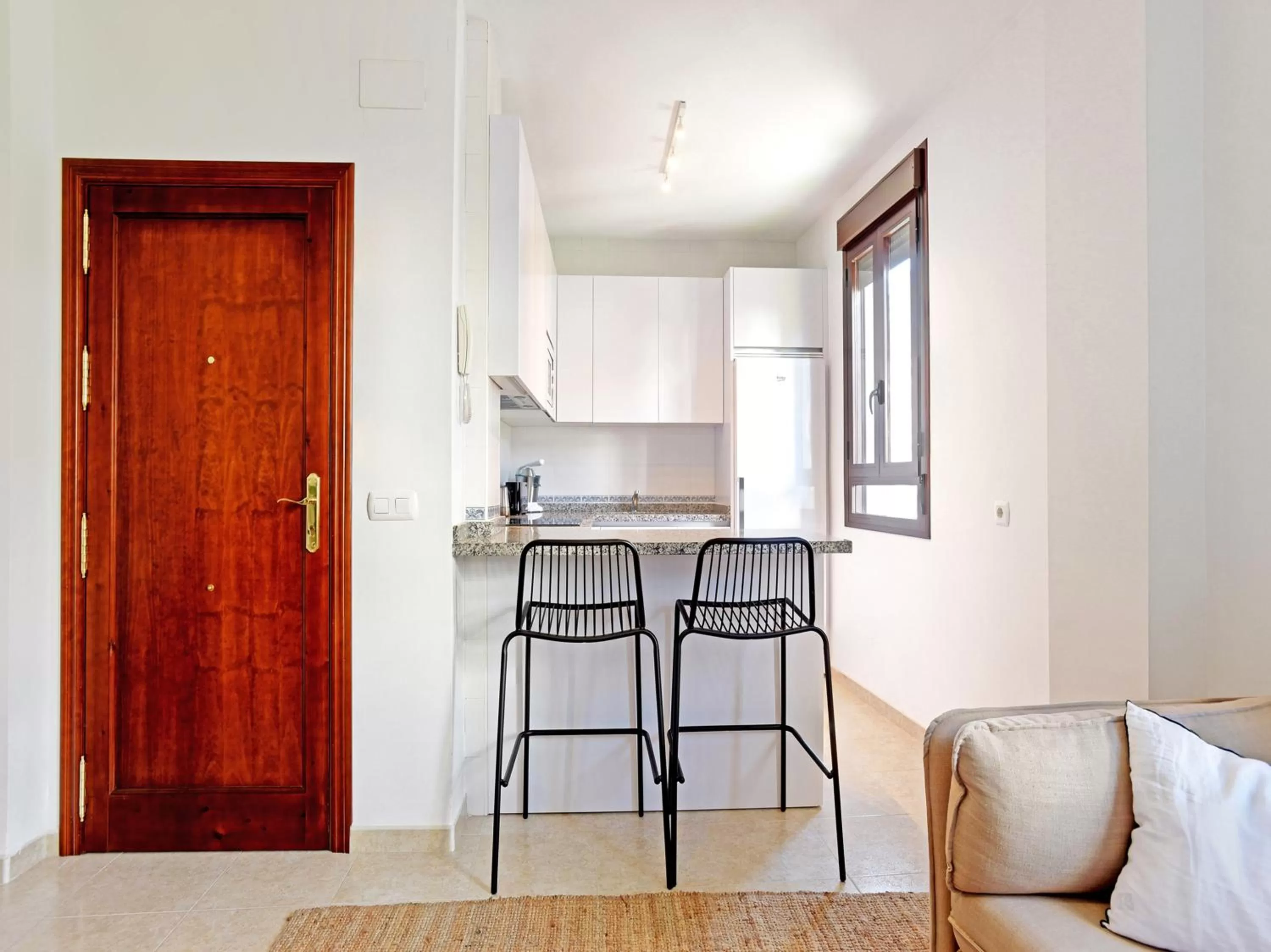 Kitchen or kitchenette in Apartamentos Santiago