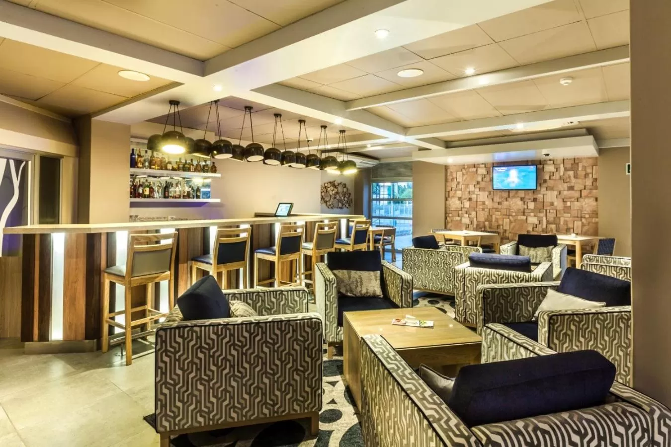 Lounge or bar in Peermont Metcourt Hotel