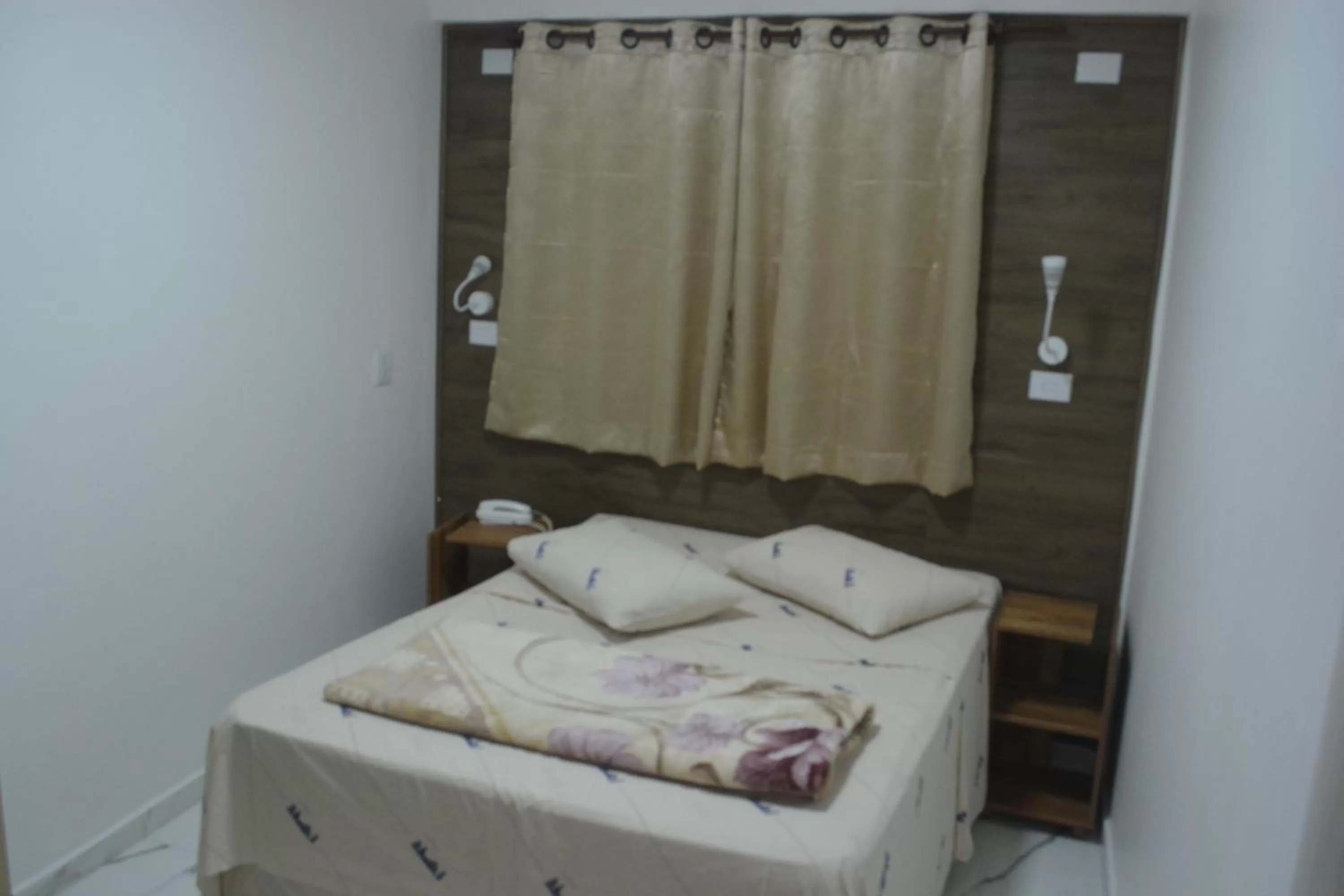 Bed in New Point Hotel