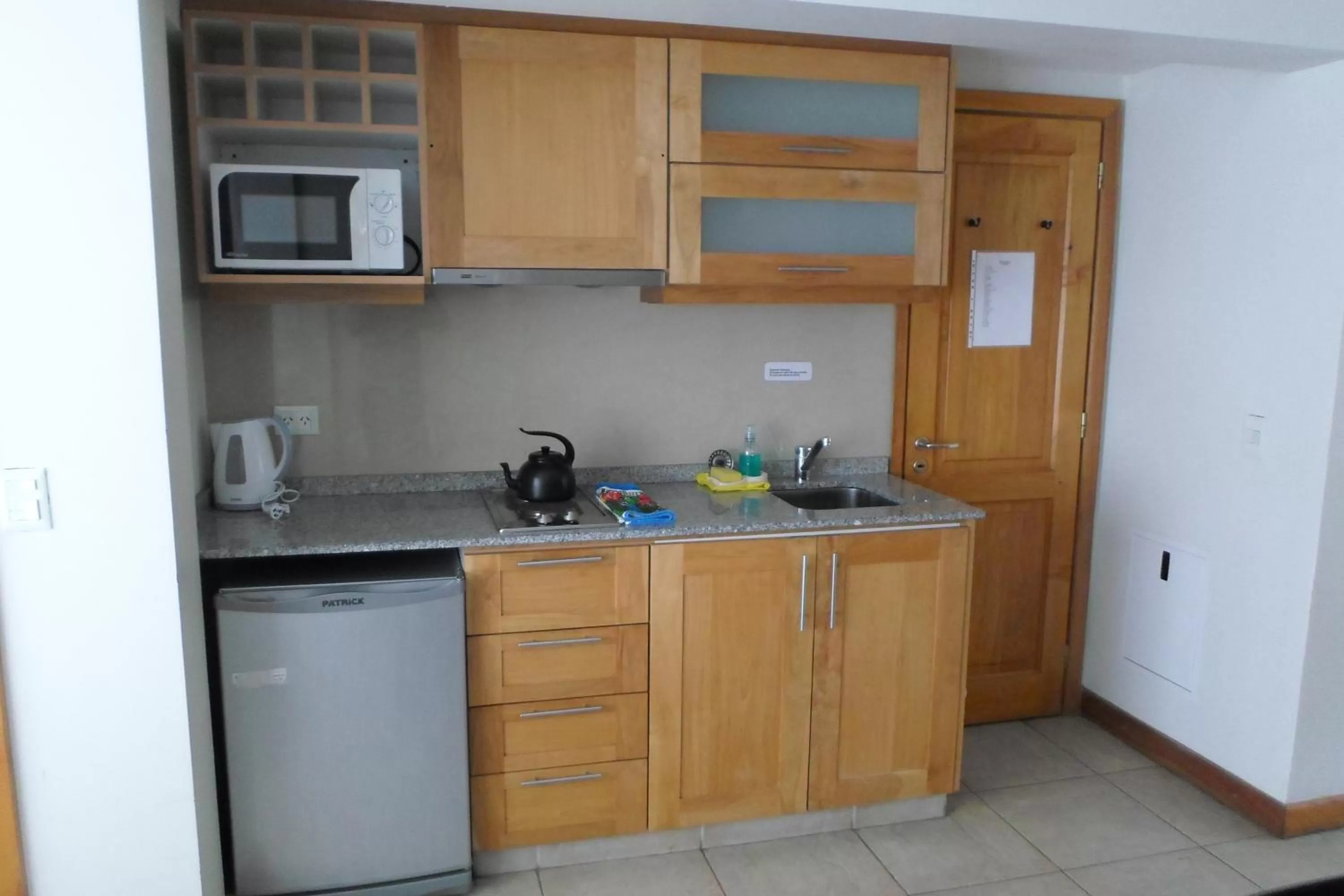 Kitchen or kitchenette in Apart Hotel Robles del Sur