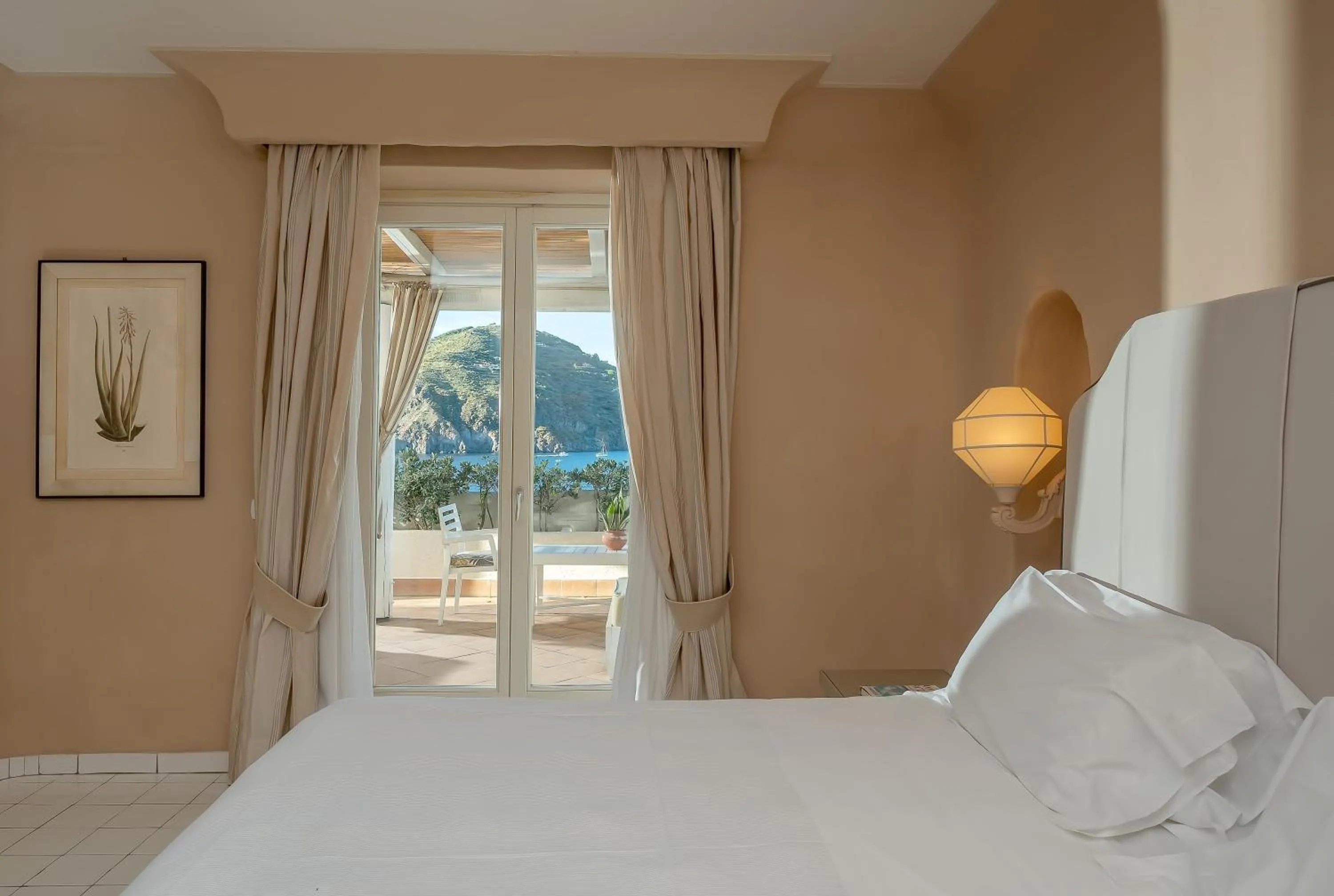 Bedroom, Bed in Therasia Resort Sea and SPA - The Leading Hotels of the World