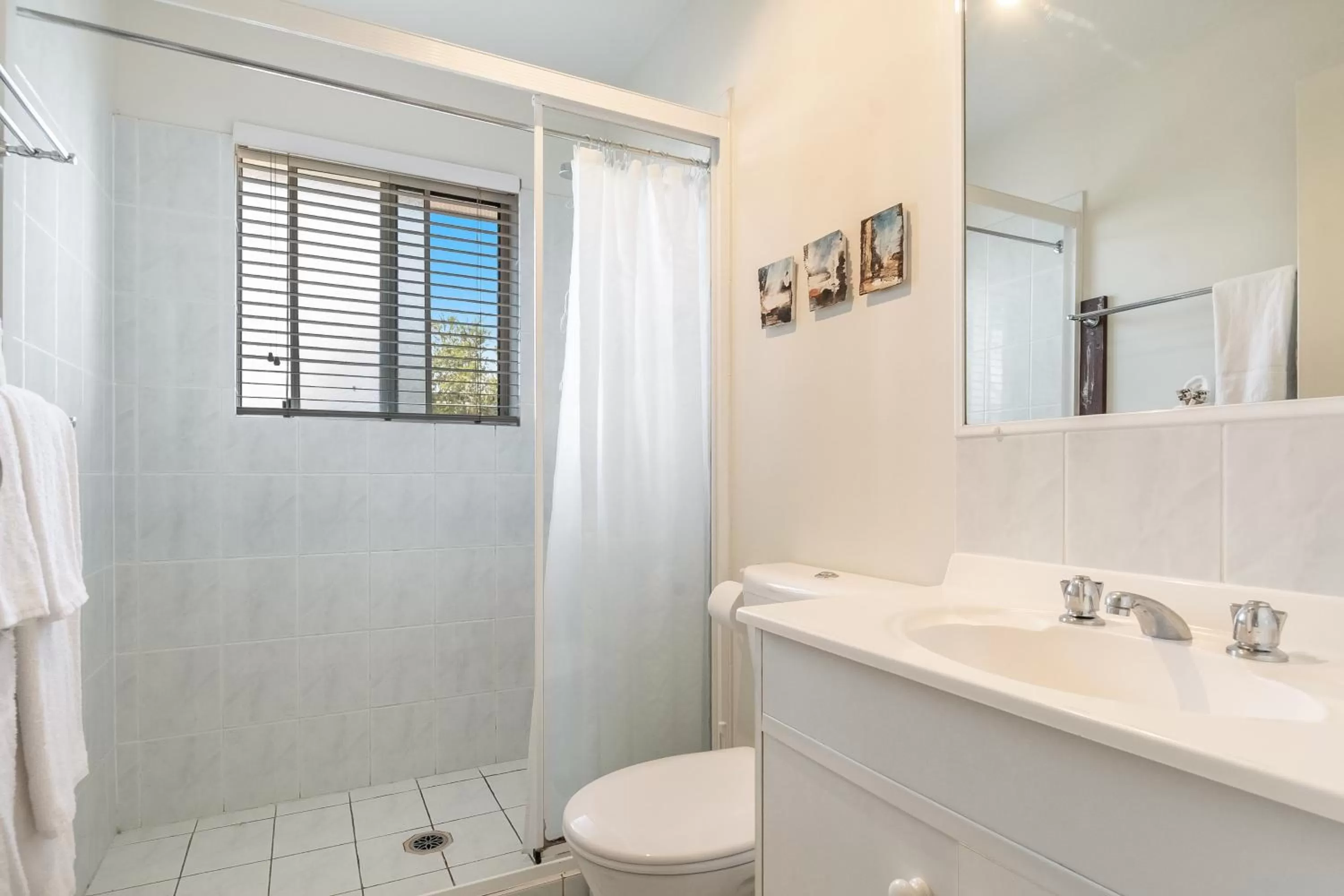 Shower in Byron Central Apartments