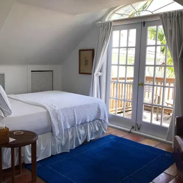 Queen Room with Balcony in Key West Bed and Breakfast Queen Room with Balcony in Key West Bed and Breakfast