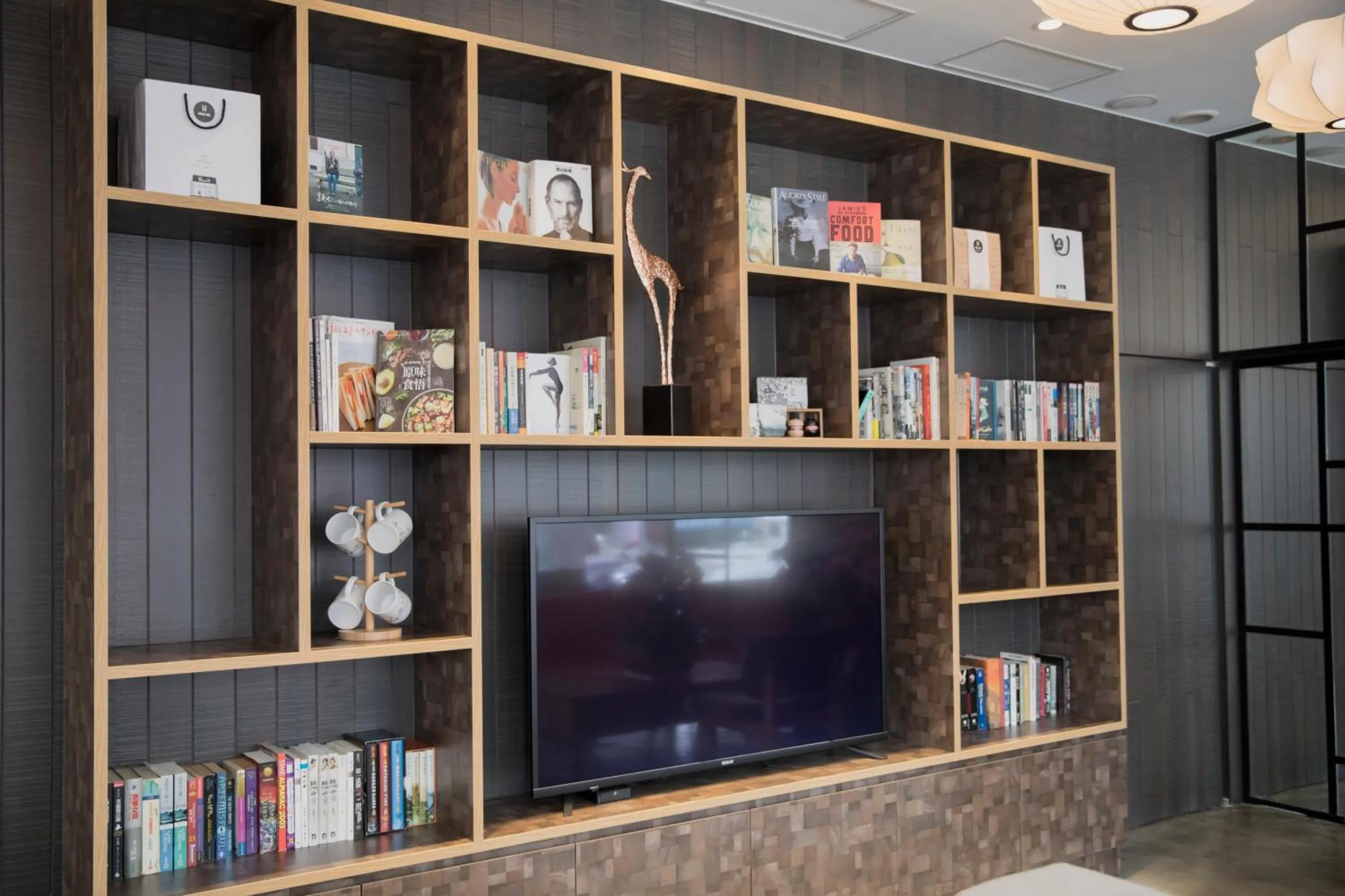 Communal lounge/ TV room in Single Inn-Kaohsiung Station