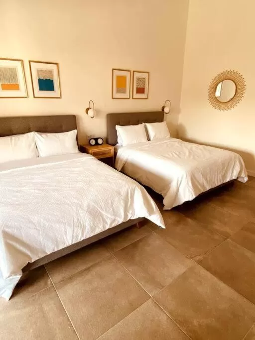 Bed in Tatala Hotel & Garden