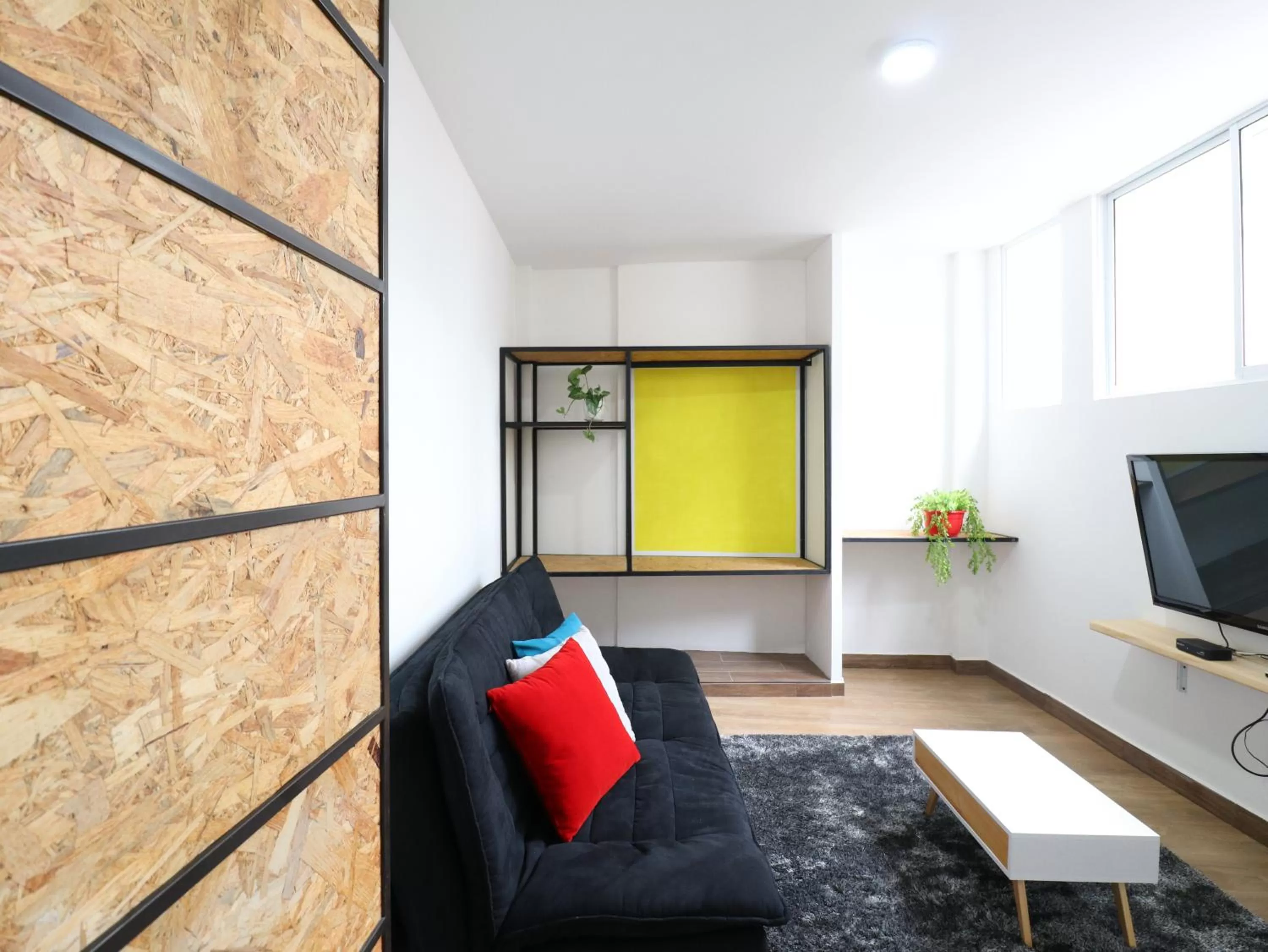 Bedroom, Seating Area in 554 Apartments