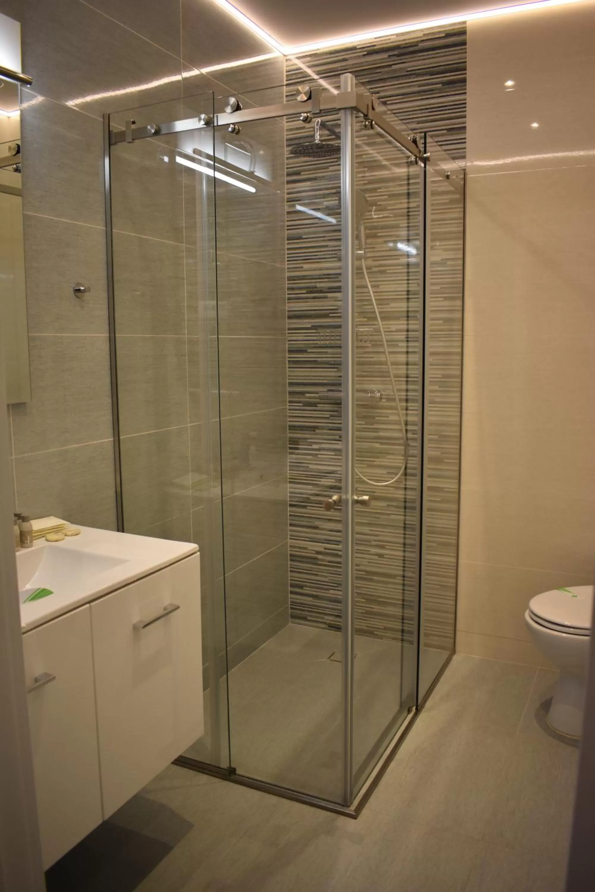 Shower in Omnia Apartments