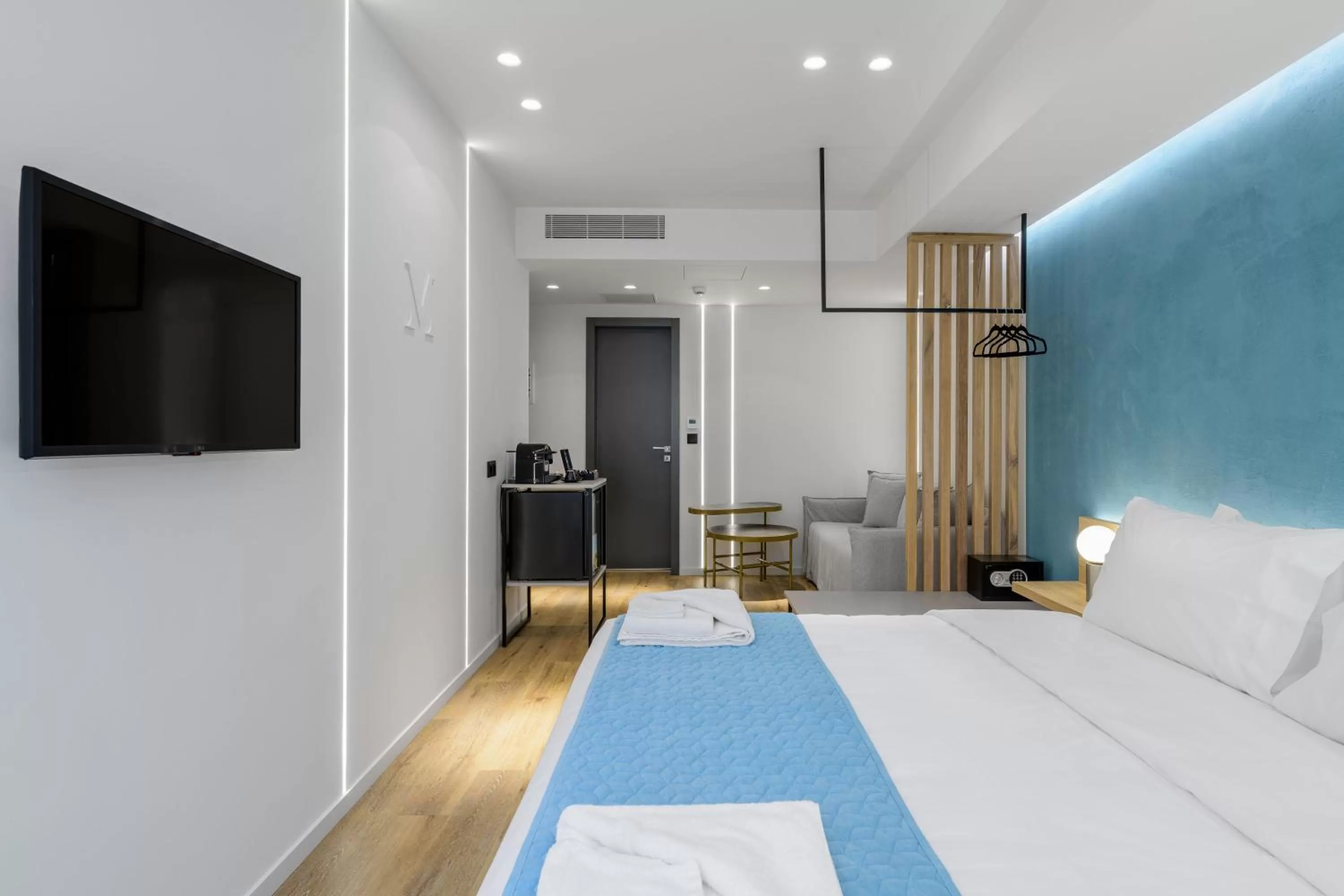 Bed in Acropolis Magenta Luxury Suites