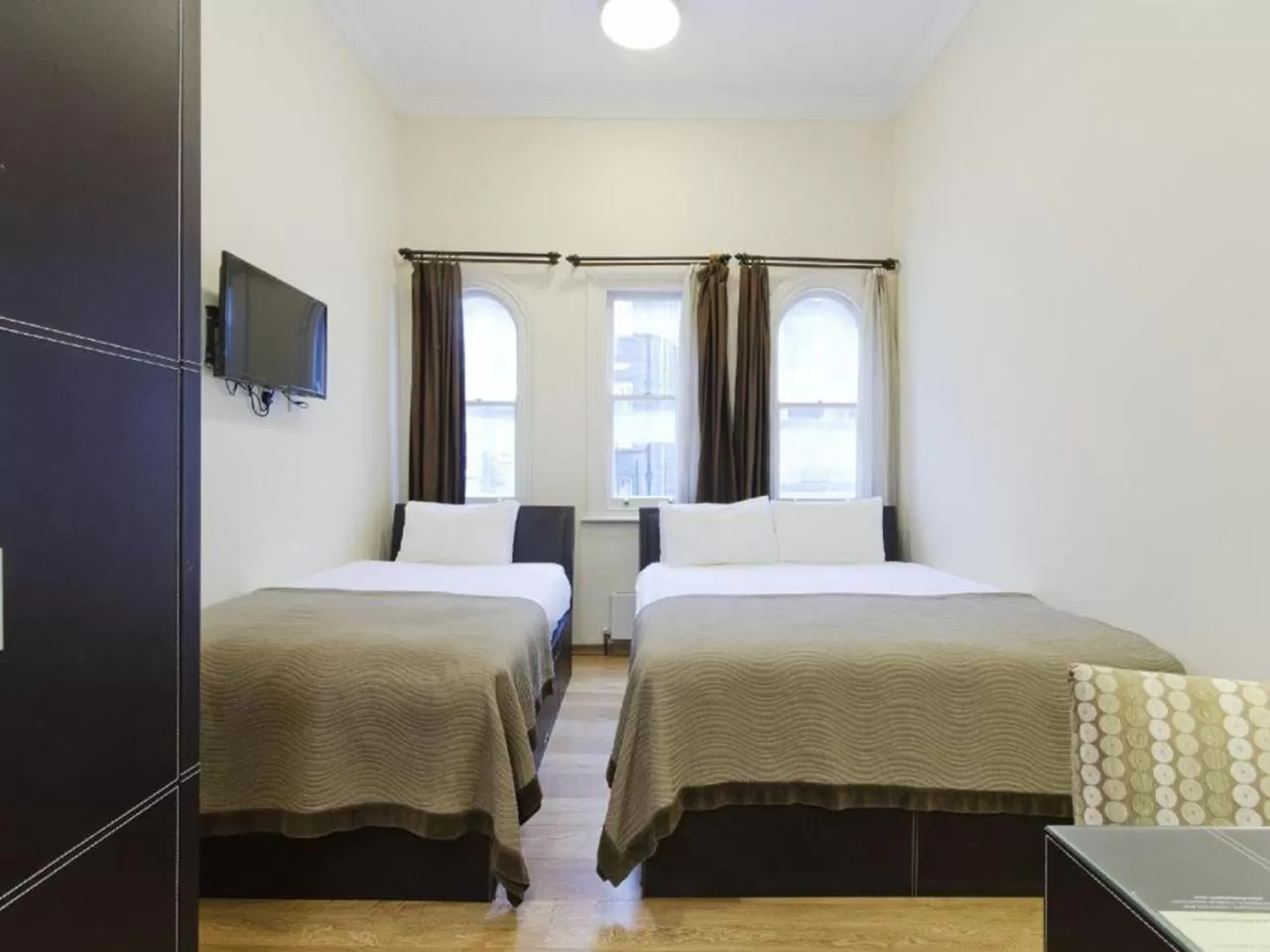 Bed in The Royale Chulan Hyde Park Hotel