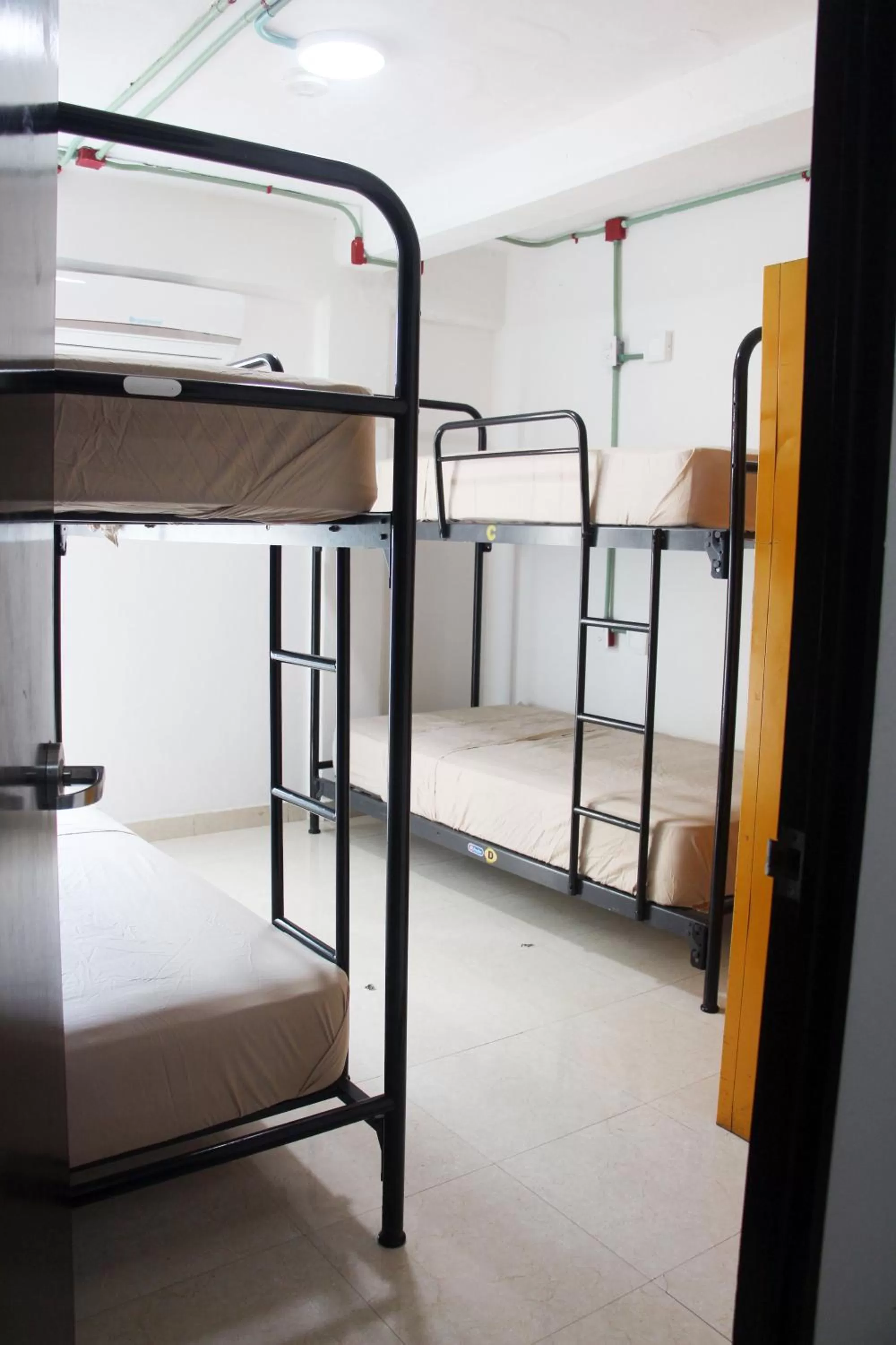 Photo of the whole room, Bunk Bed in Hotel & Hostal Casa de Luz Cancun