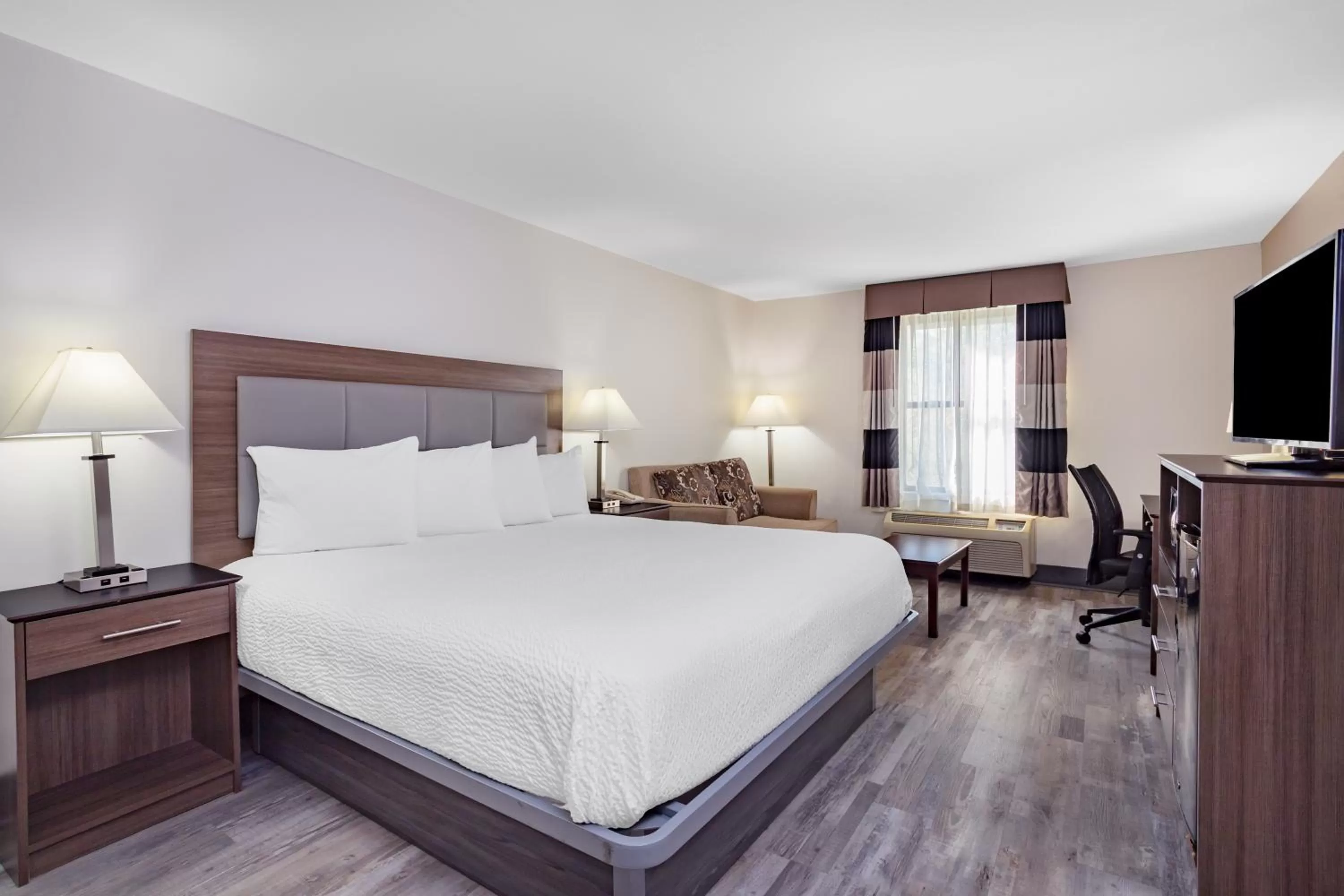 Bed in Ramada by Wyndham Hendersonville