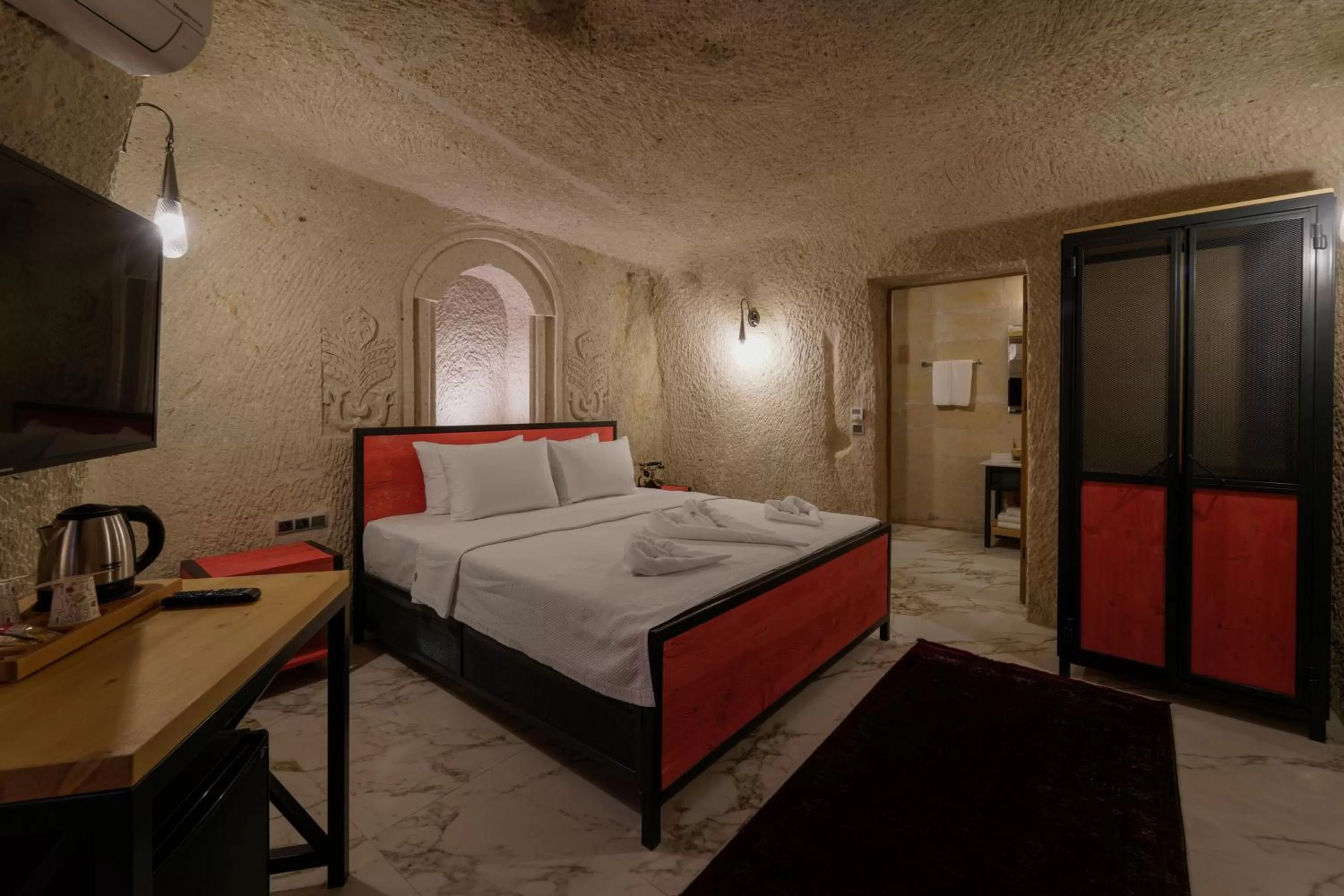 Bed in The Niche Cave Hotel