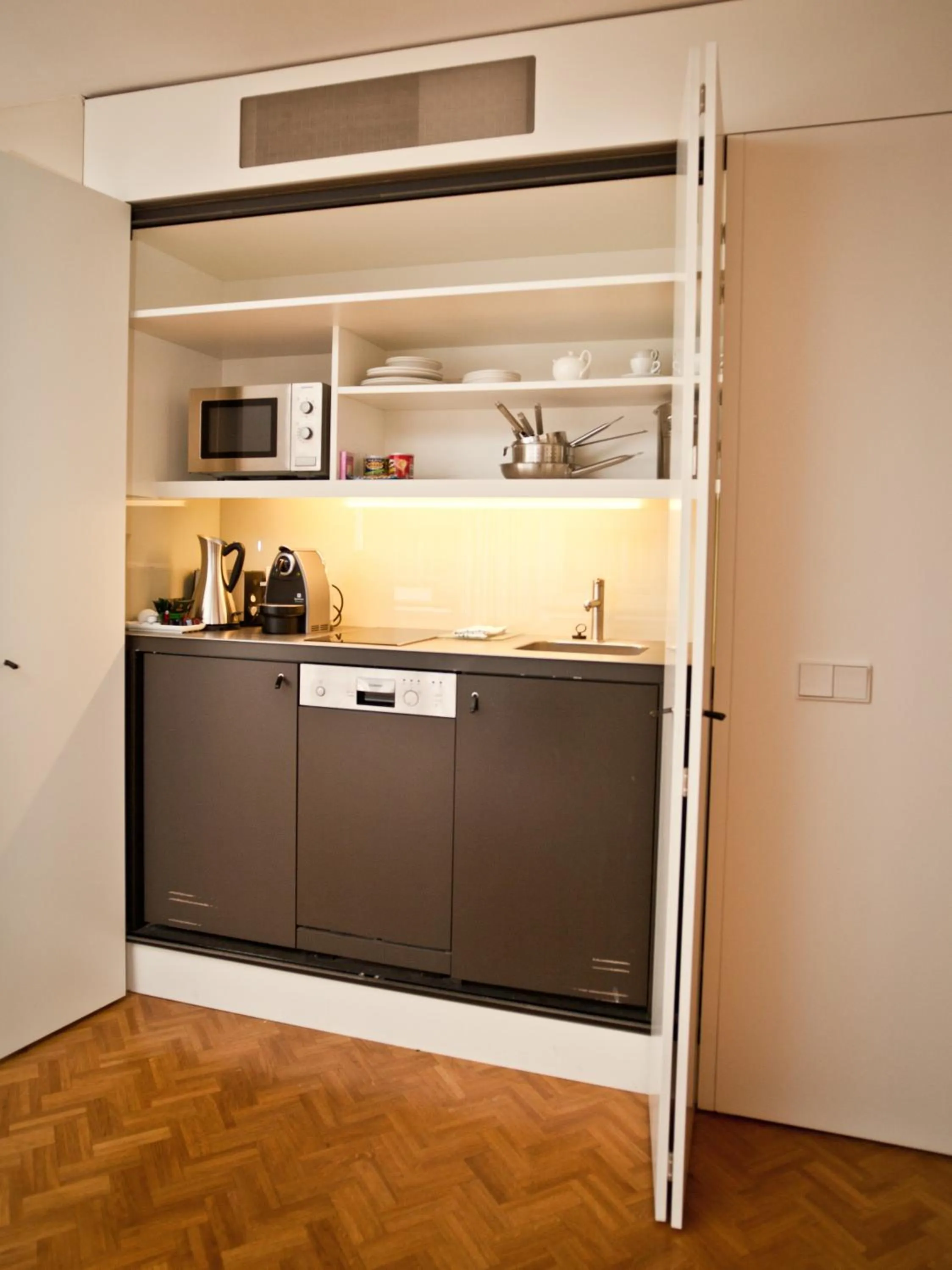 Kitchen or kitchenette in CORTIINA Hotel