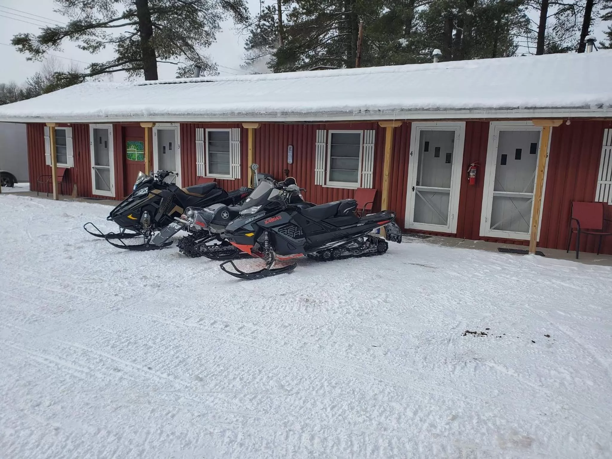 Property building in Two Rivers Motel and Cabins of Kenton, MI