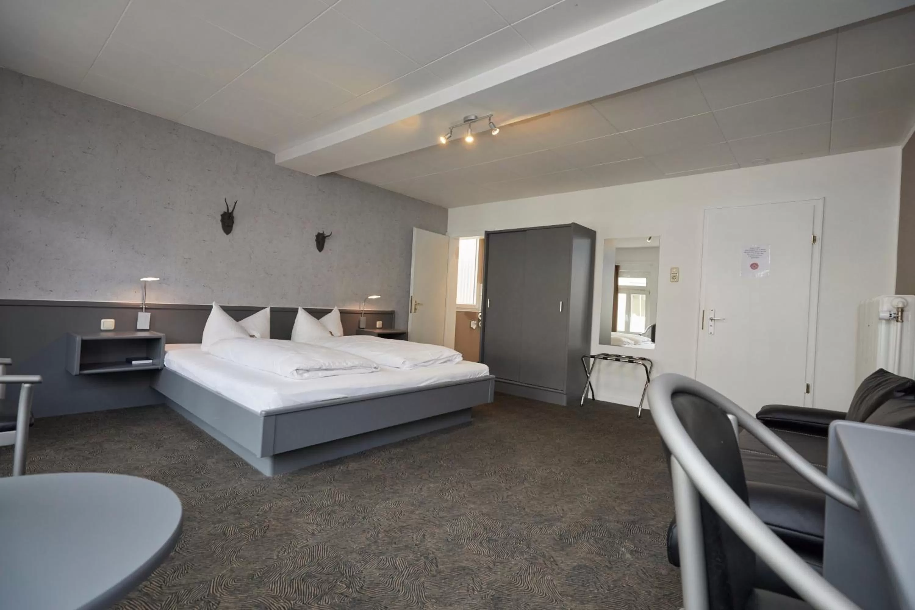 Photo of the whole room, Bed in Hotel Schlemmer Das familäre Altstadt - Hotel mit Herz