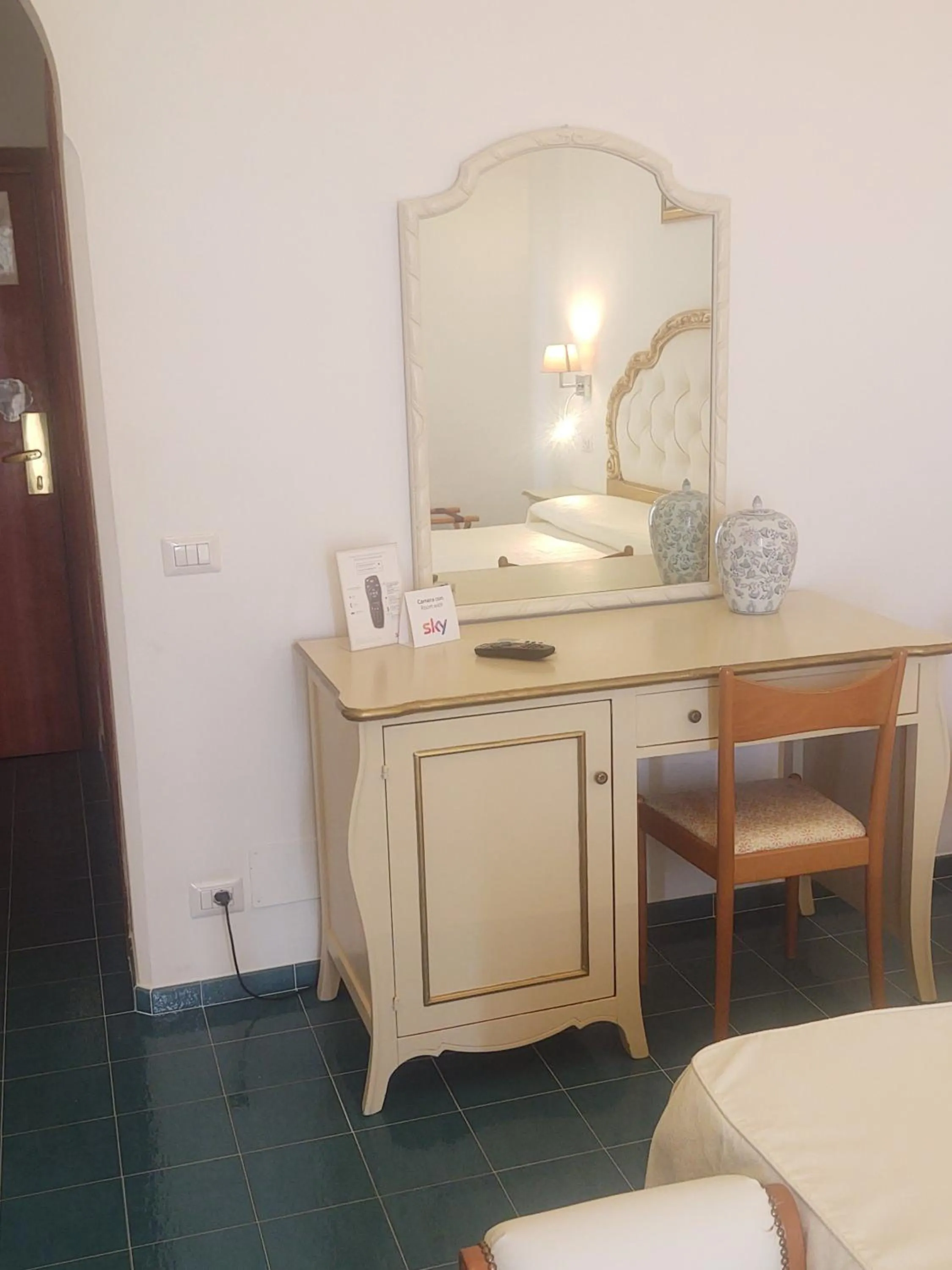 Bedroom in Hotel La Perla