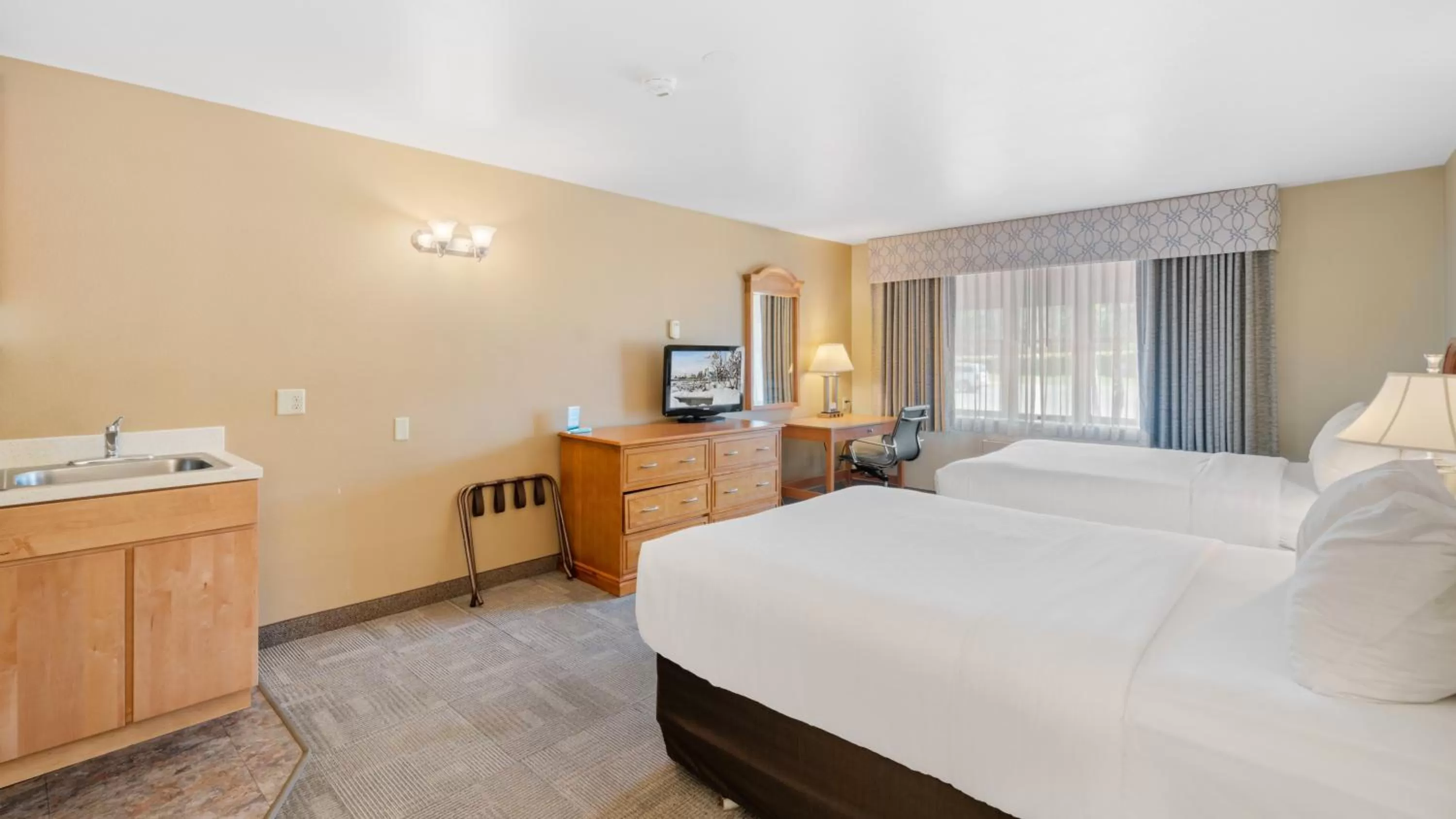 Bed in Clarion Hotel & Suites Fairbanks near Ft Wainwright