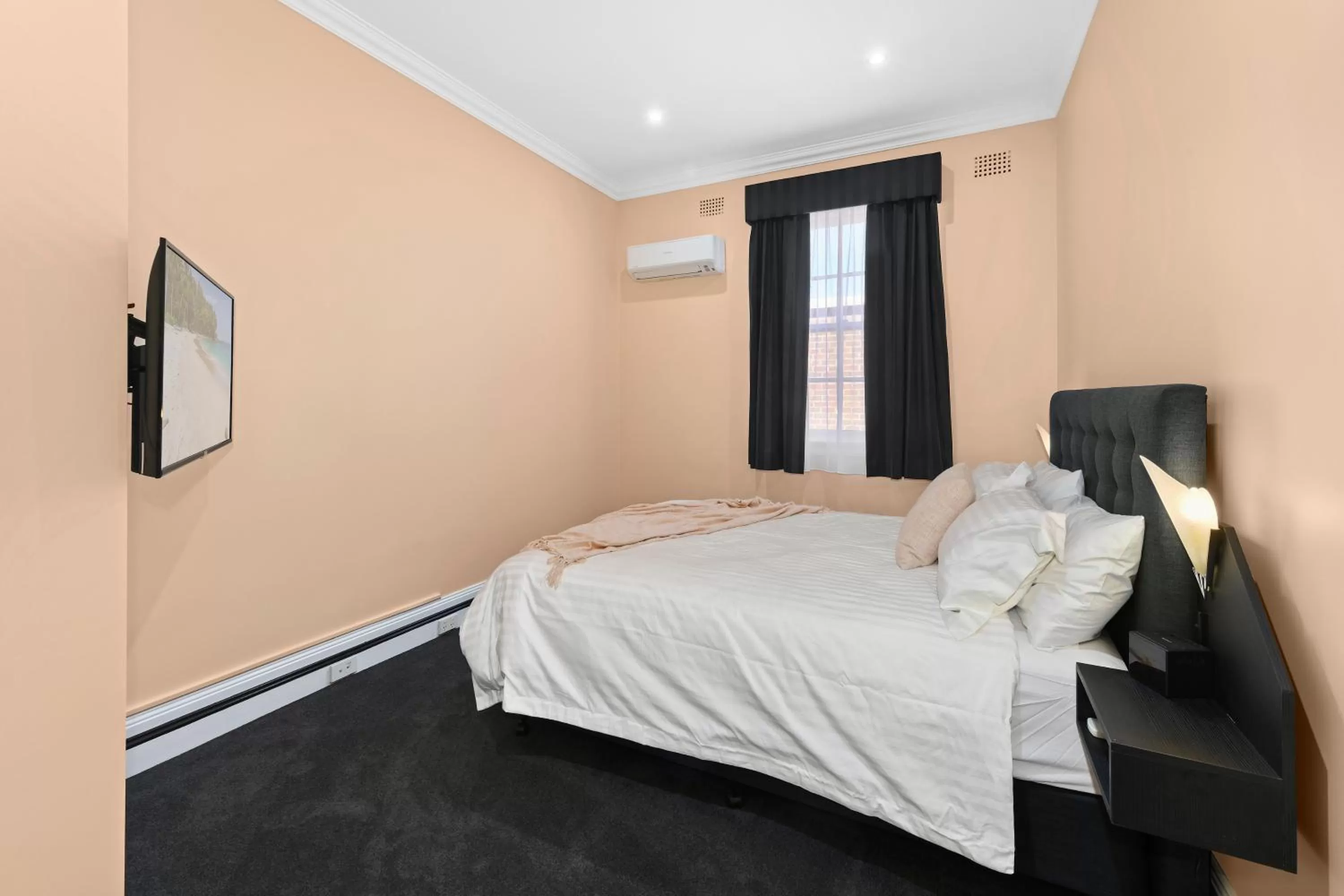 Bed in The Star Boutique Apartments