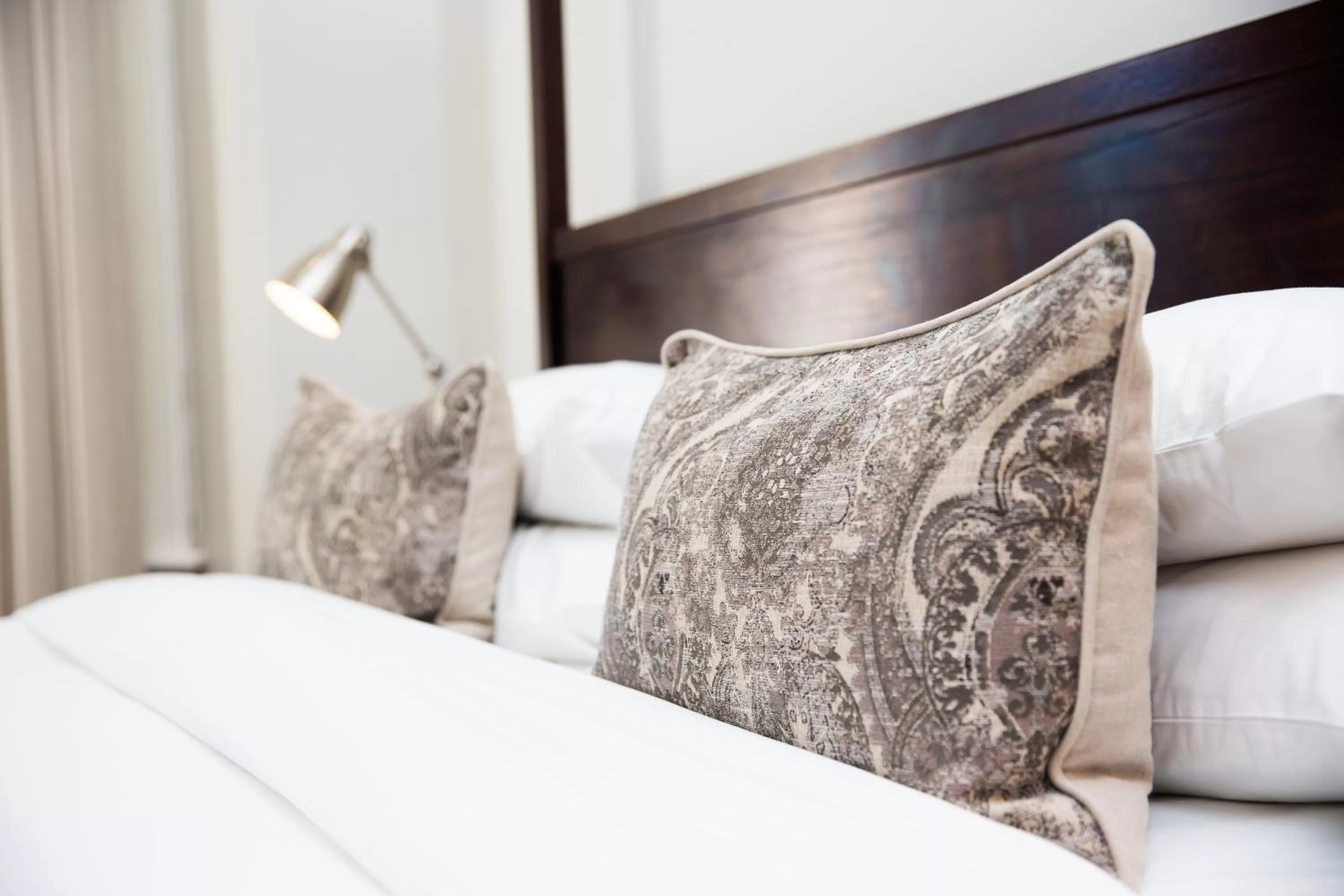 Decorative detail, Bed in River Manor Boutique Hotel by The Living Journey Collection