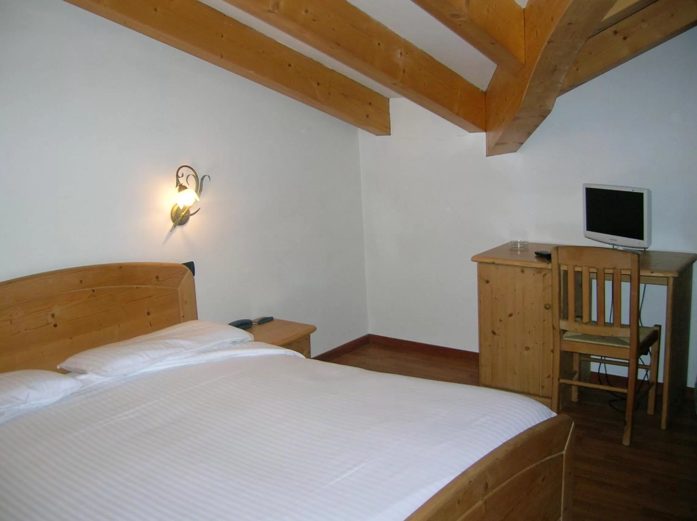 Photo of the whole room, Bed in Hotel Villa Fosine Spa & Wellness