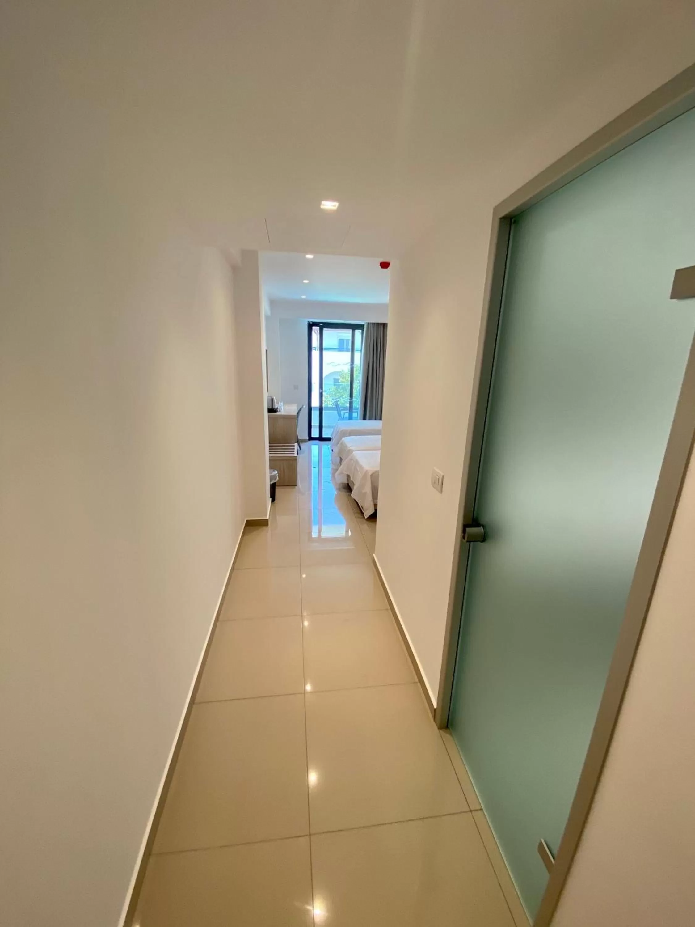 Bedroom in Agrelli Hotel & Suites