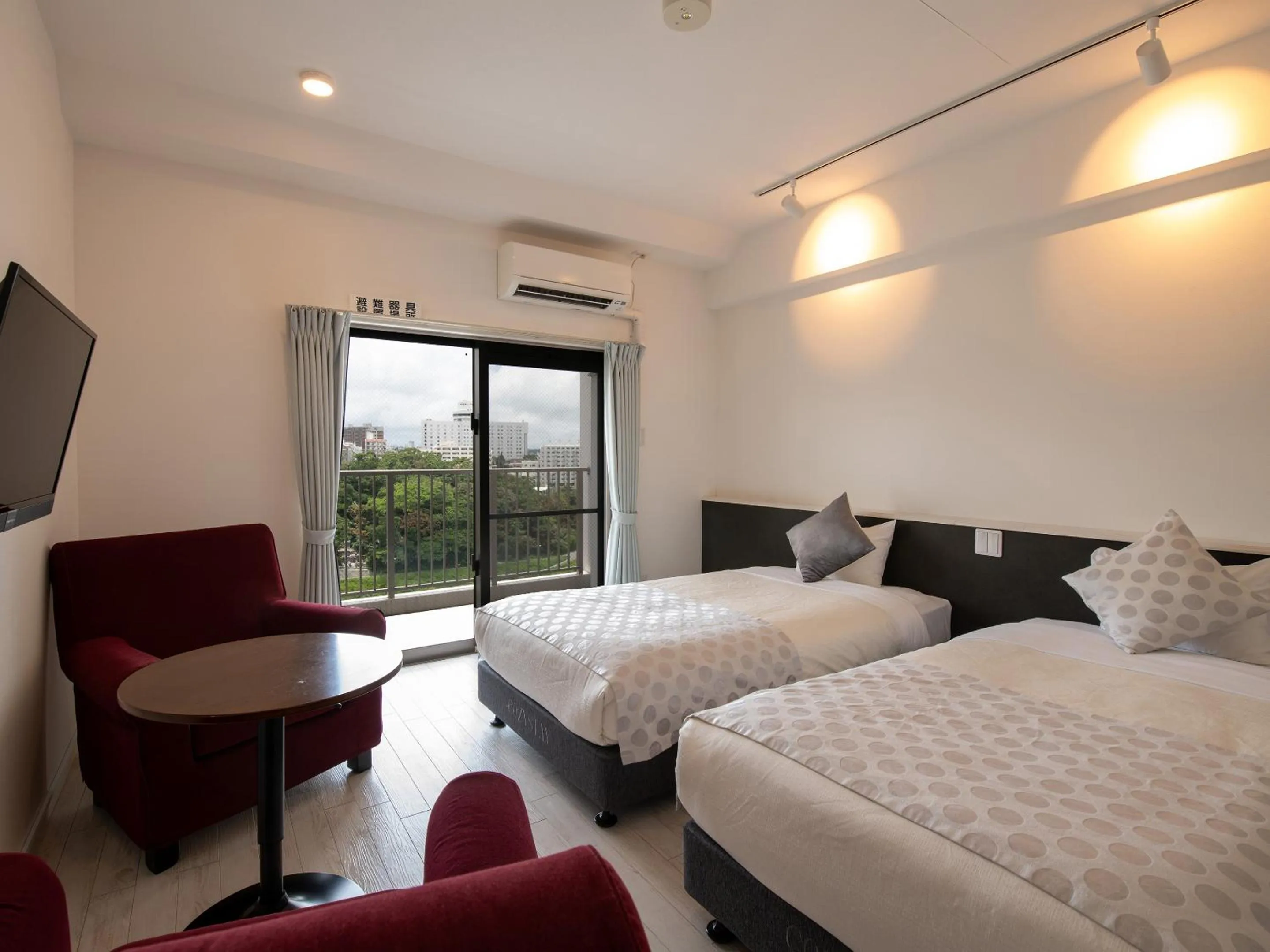 TV and multimedia, Bed in Cozy Stay in Naha