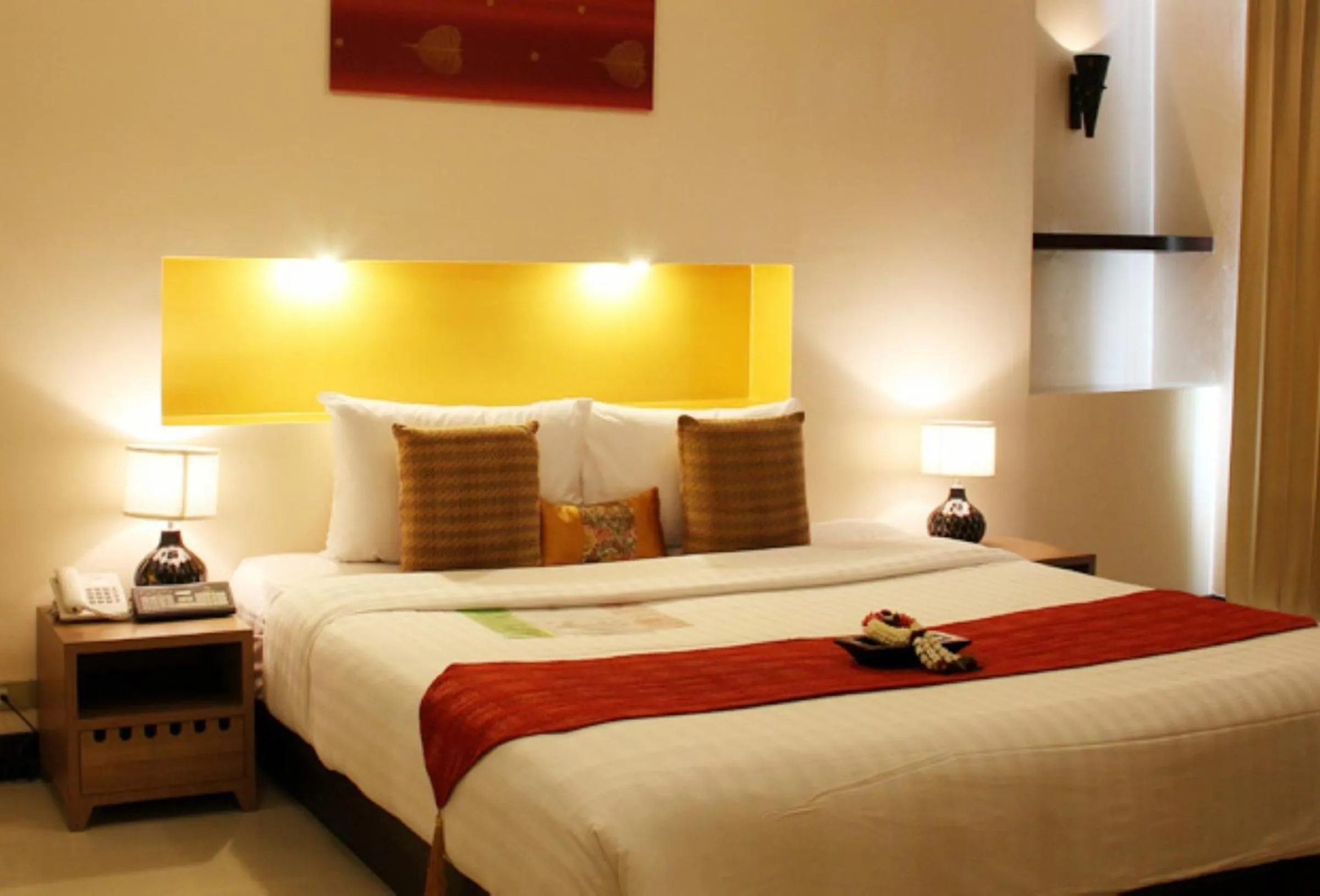 Bed in Maninarakorn Hotel