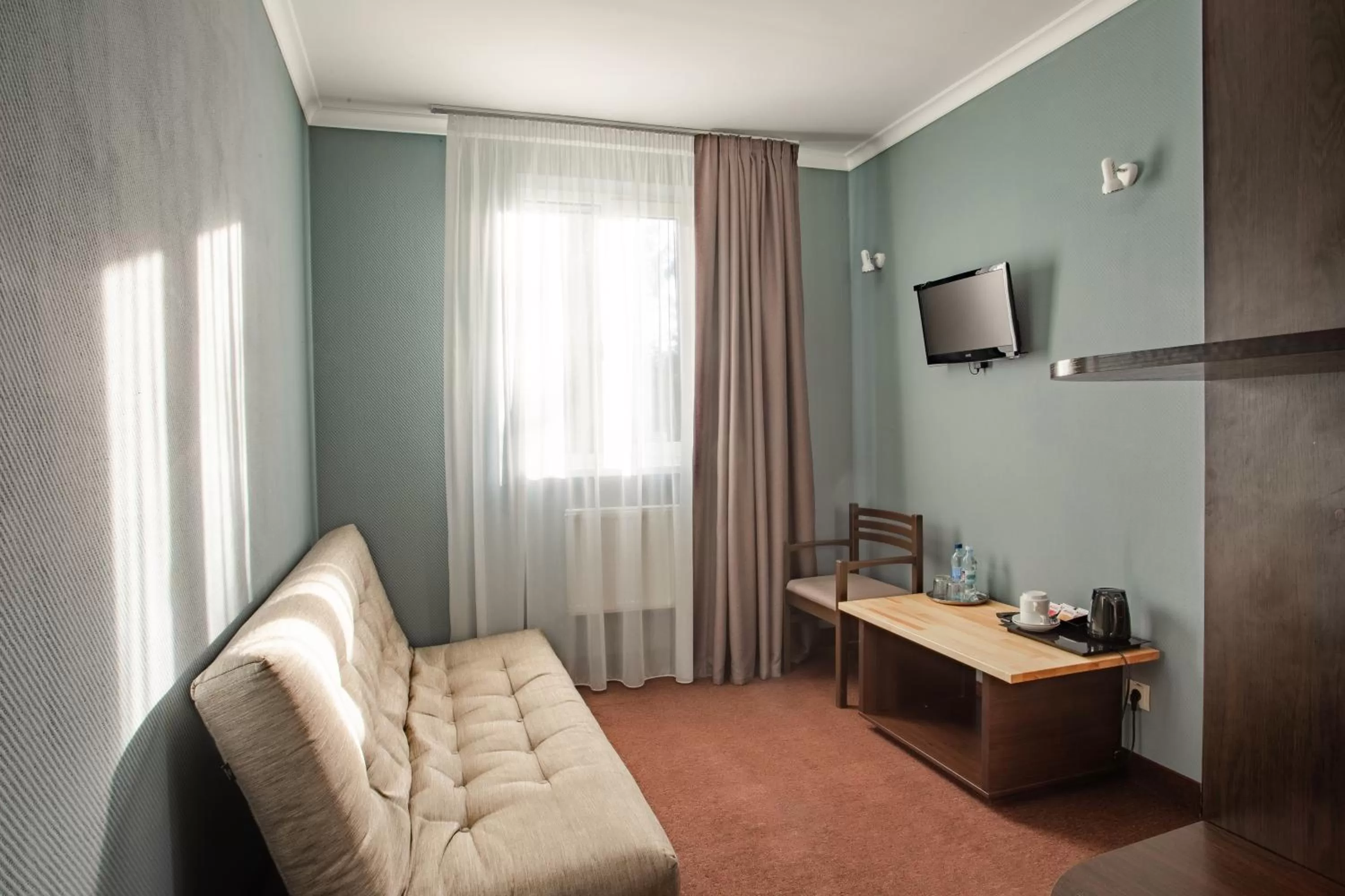 Living room in Wellland Hotel