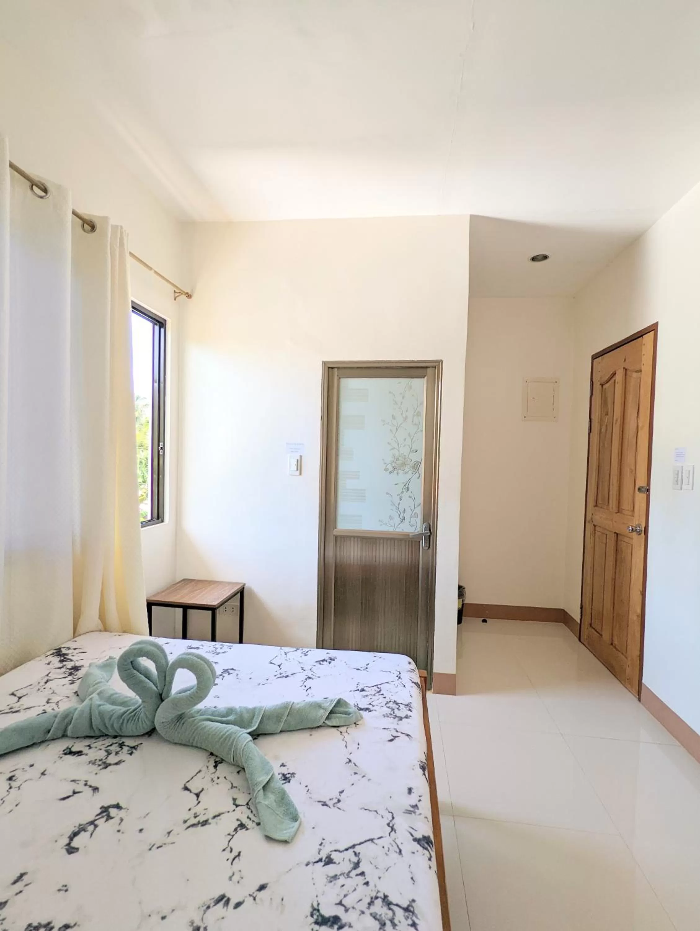 Bed in Charlina Inn Panglao