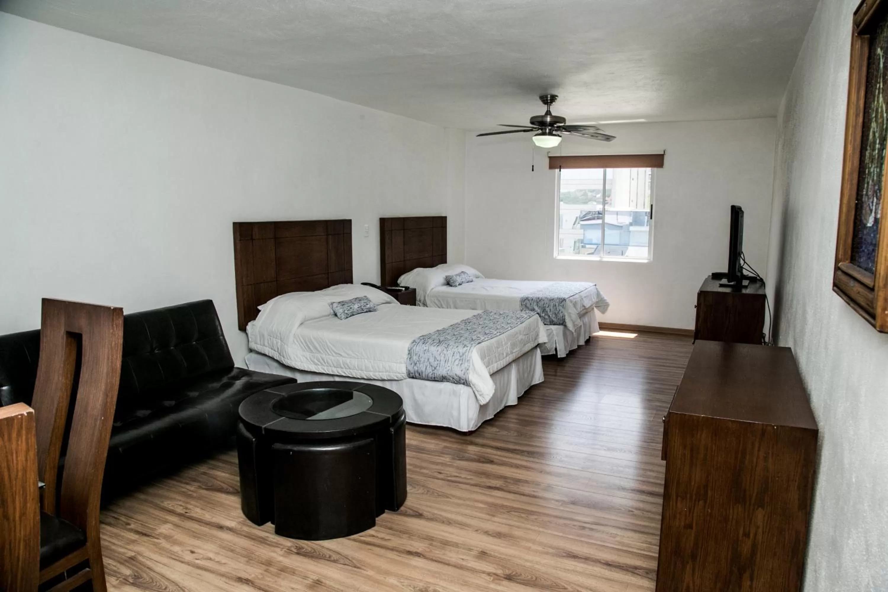 Photo of the whole room, Bed in Booking Dioh