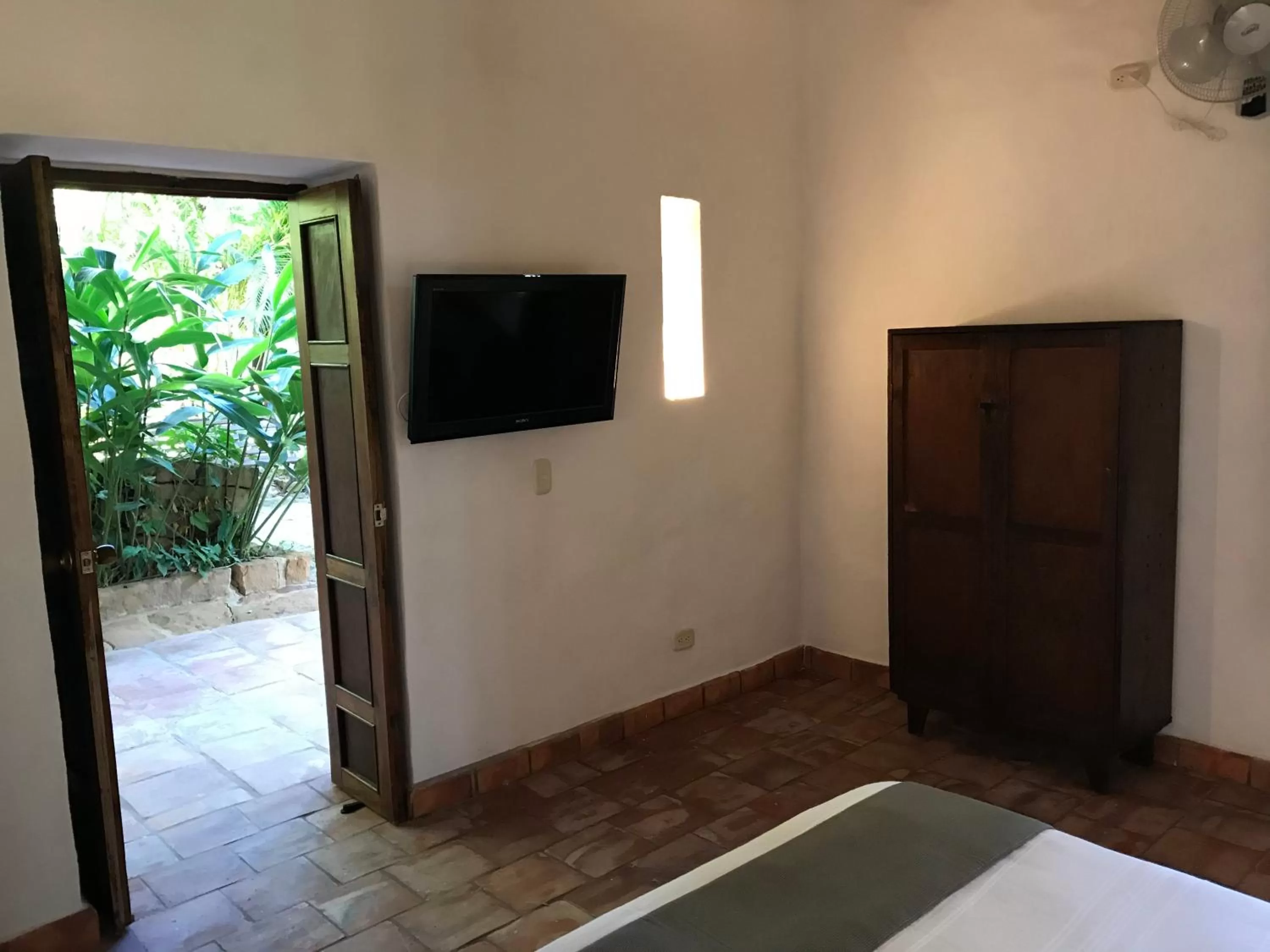 TV and multimedia, TV/Entertainment Center in Achiotte Hotel Boutique by Masaya