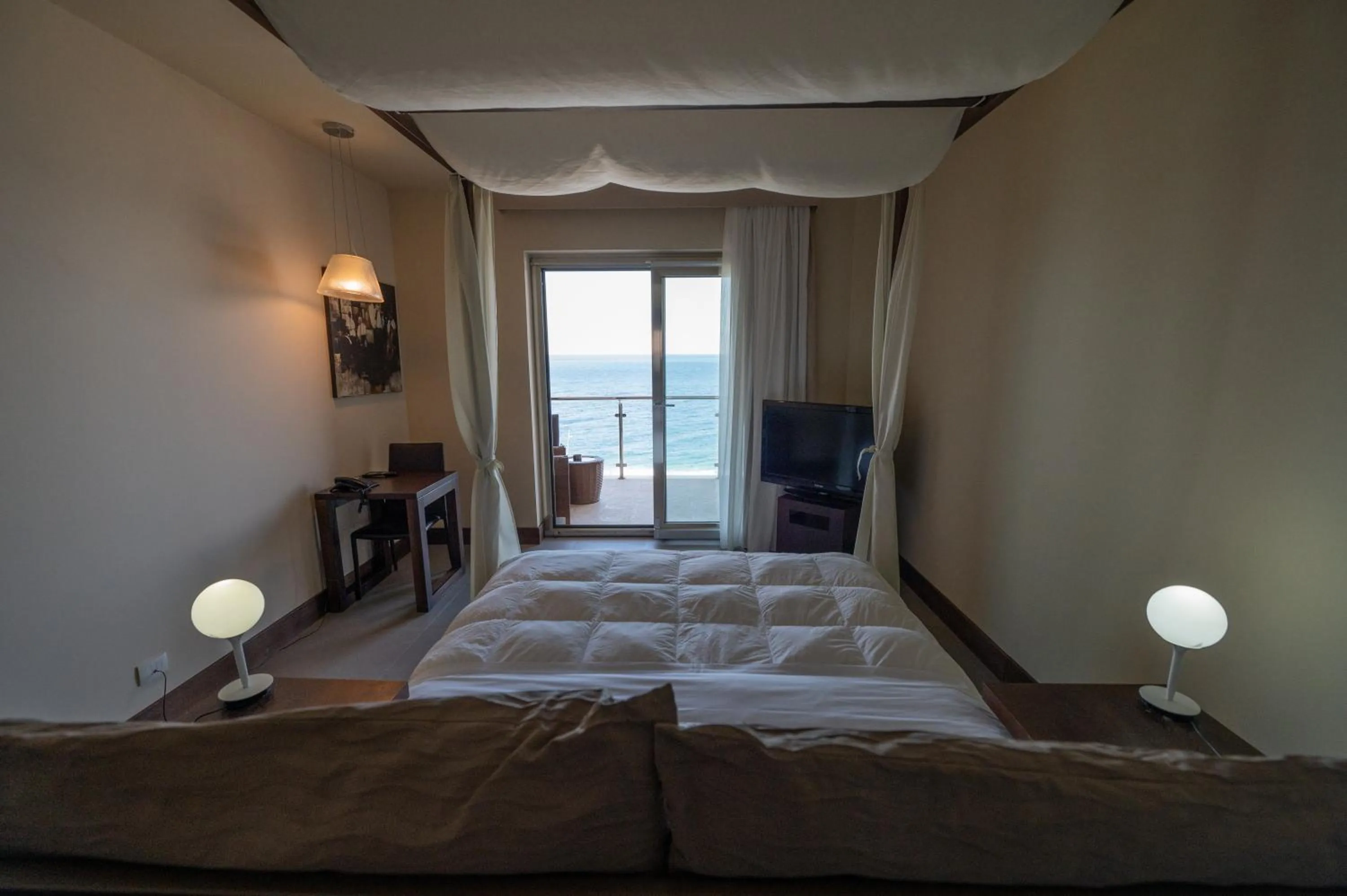 Bed in Main Palace Hotel