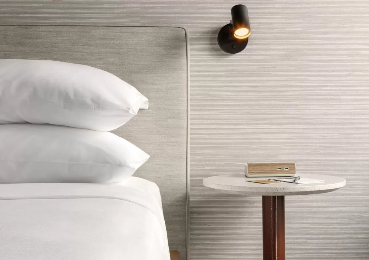 Bed in Hotel Tupelo, a Wyndham Hotel