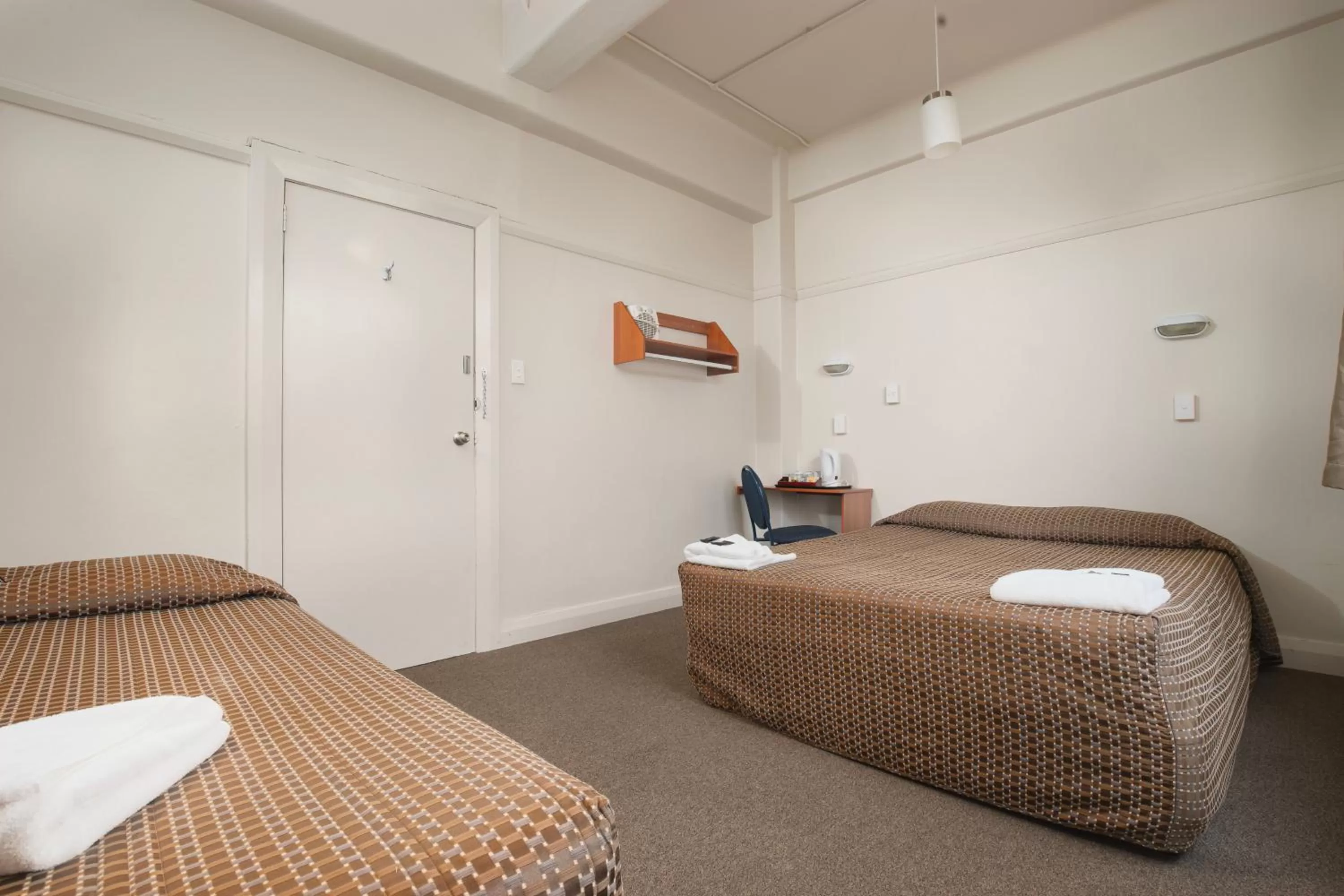 Guests, Bed in Kiwi International Hotel