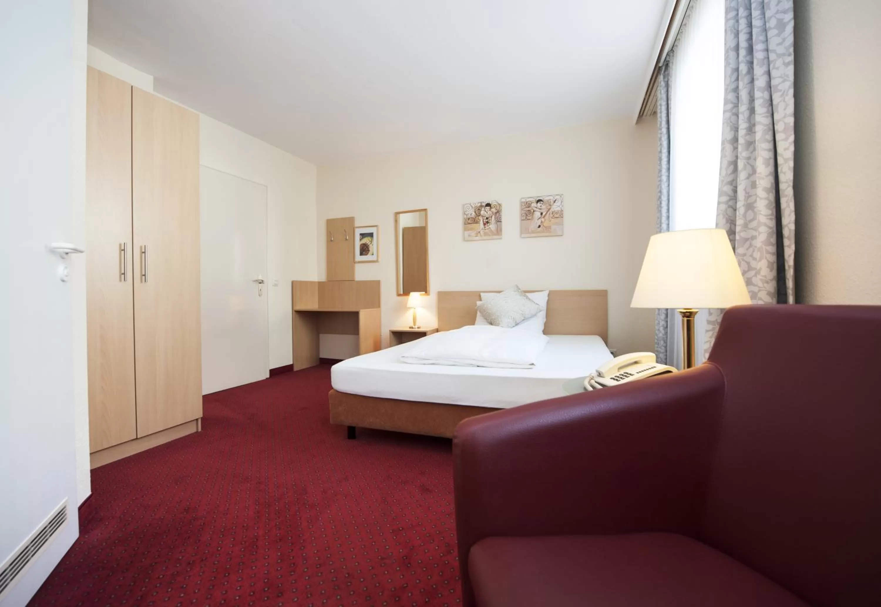 Photo of the whole room, Bed in Comfort Garni Stadtzentrum Hotel