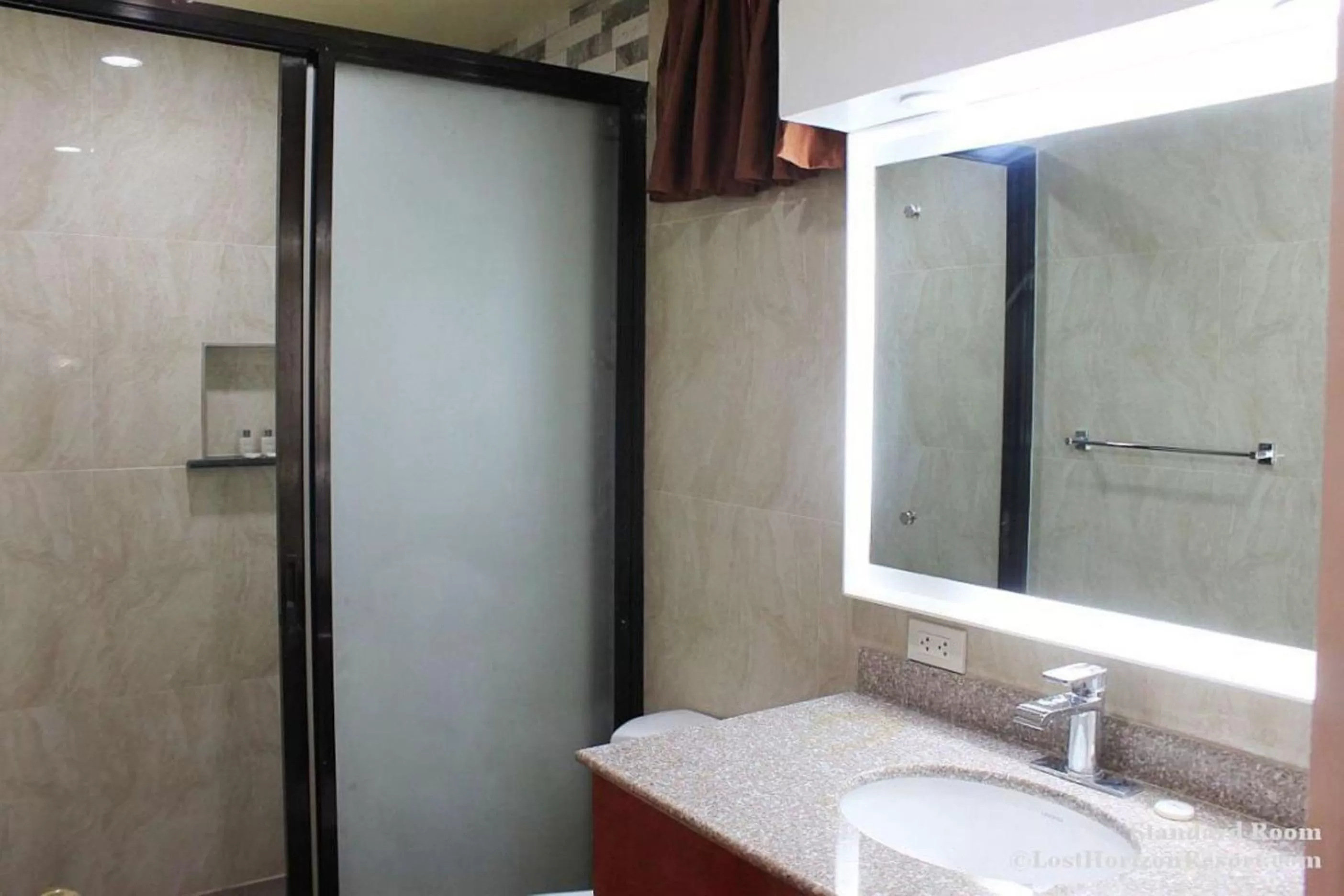 Bathroom in Lost Horizon Beach Dive Resort